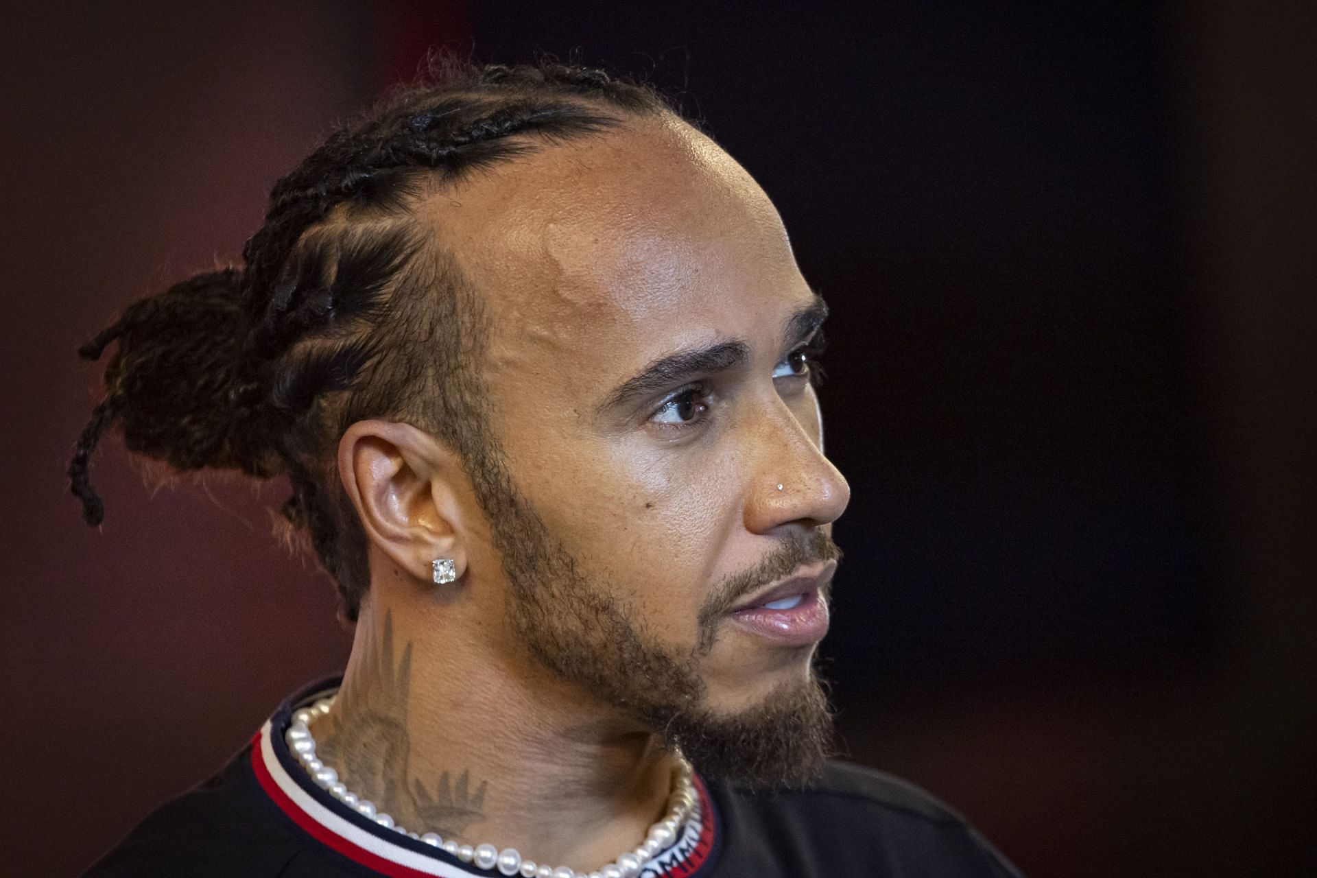 Lewis Hamilton of Great Britain driver of Mercedes-AMG Petronas F1 Team talks to media and press after the  race, the Formula One Grand Prix of Abu Dhabi at Yas Marina Circuit, Abu Dhabi, United Arab Emirates on December 8, 2024 (Photo by Nicolas Economou/NurPhoto via Getty Images) - Source: Getty