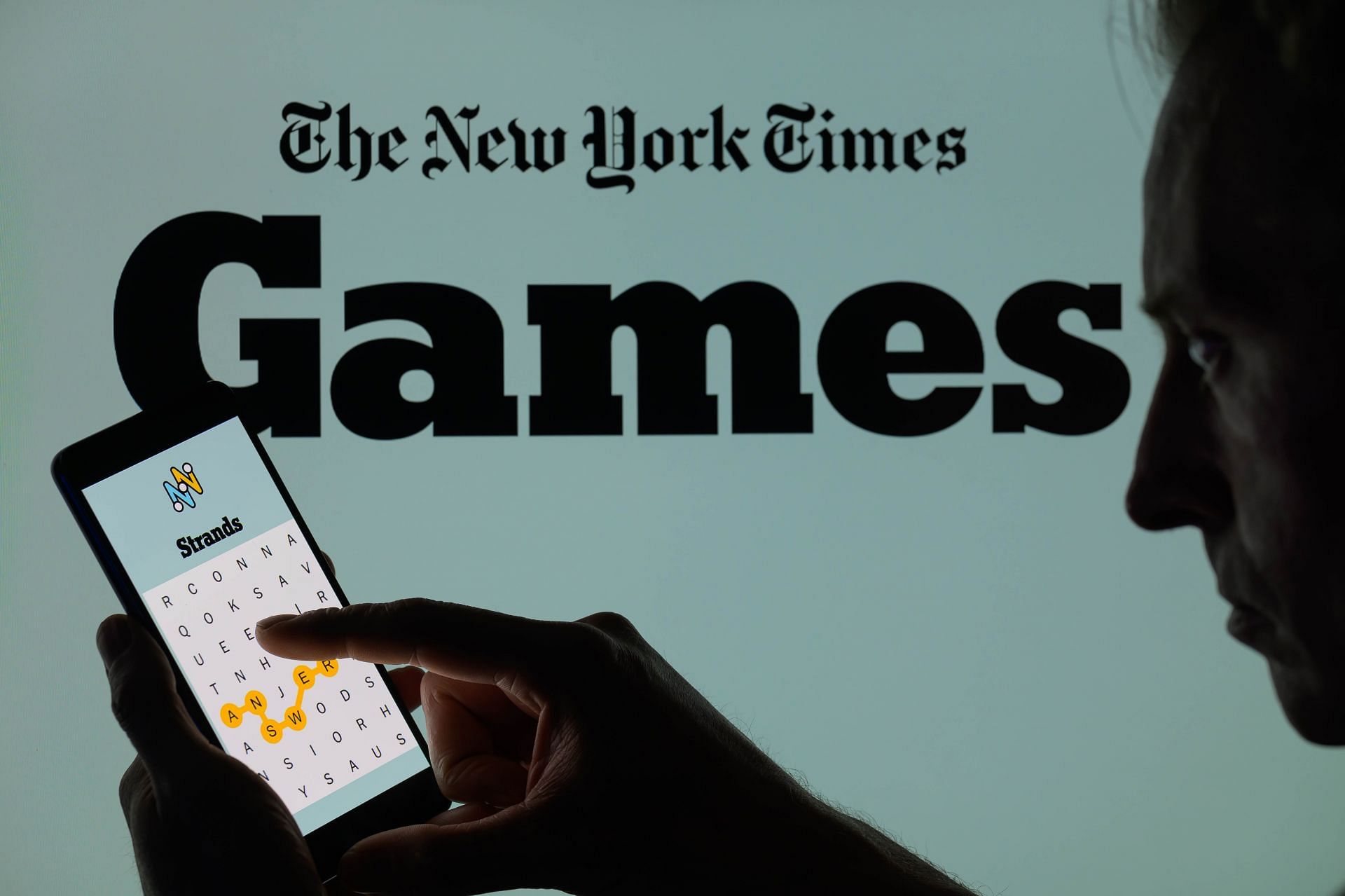 NYT Strands Game - Photo Illustration - Source: Getty