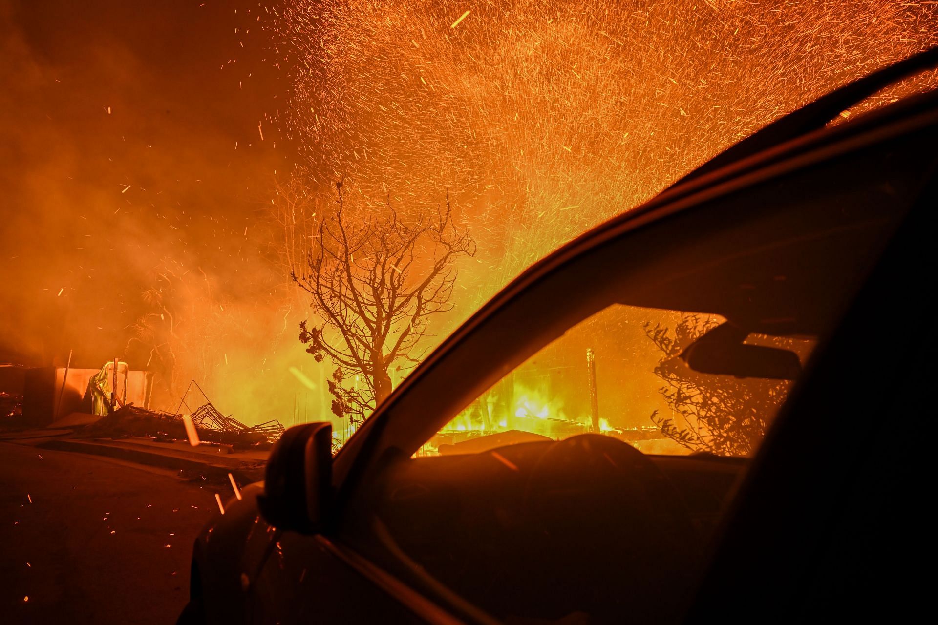 Wildfires tear through Los Angeles - Source: Getty