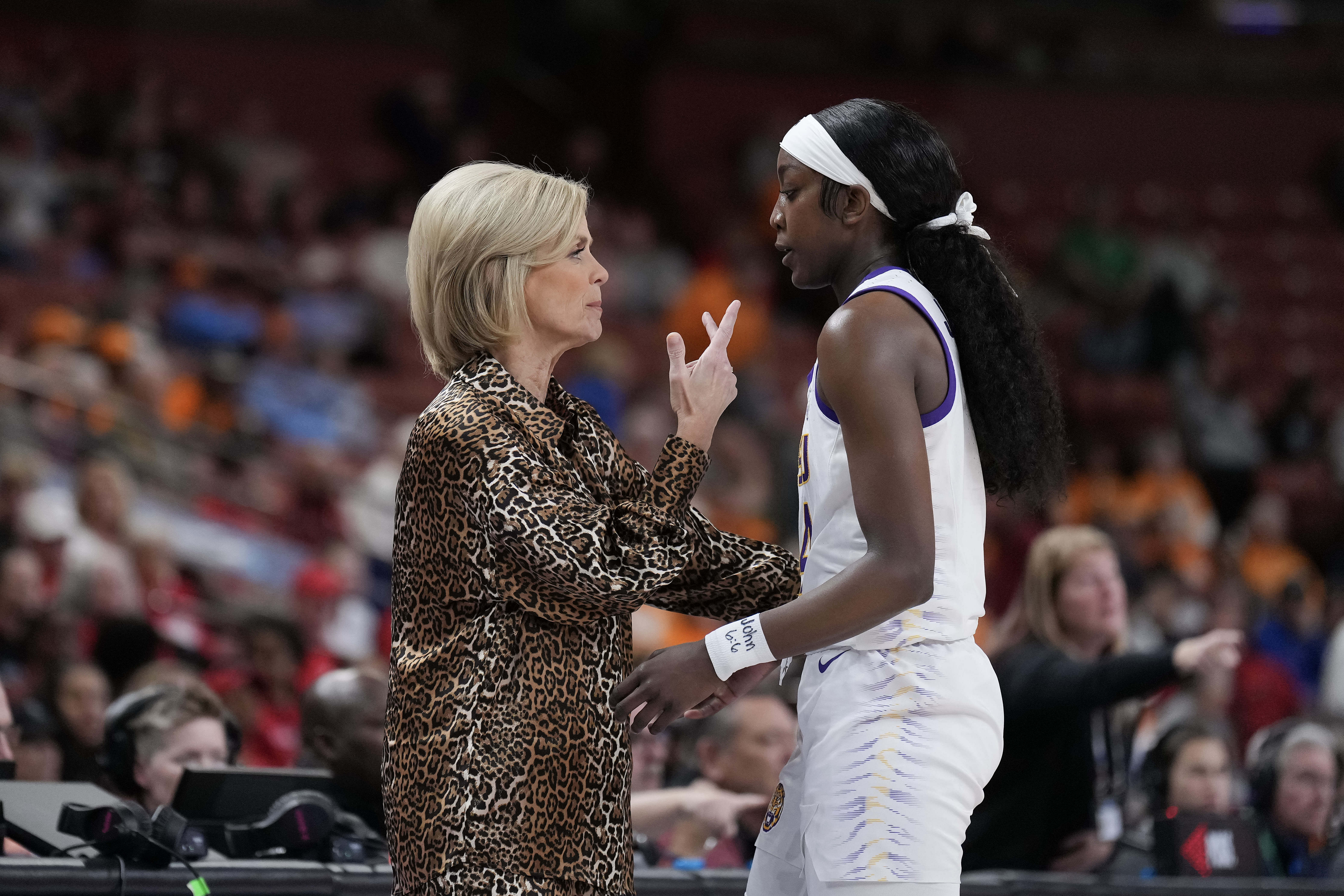 LSU Tigers coach Kim Mulkey talks with guard Flau&#039;jae Johnson (#4) in the first quarter of their game against the Georgia Lady Bulldogs at Bon Secours Wellness Arena. Photo: Imagn