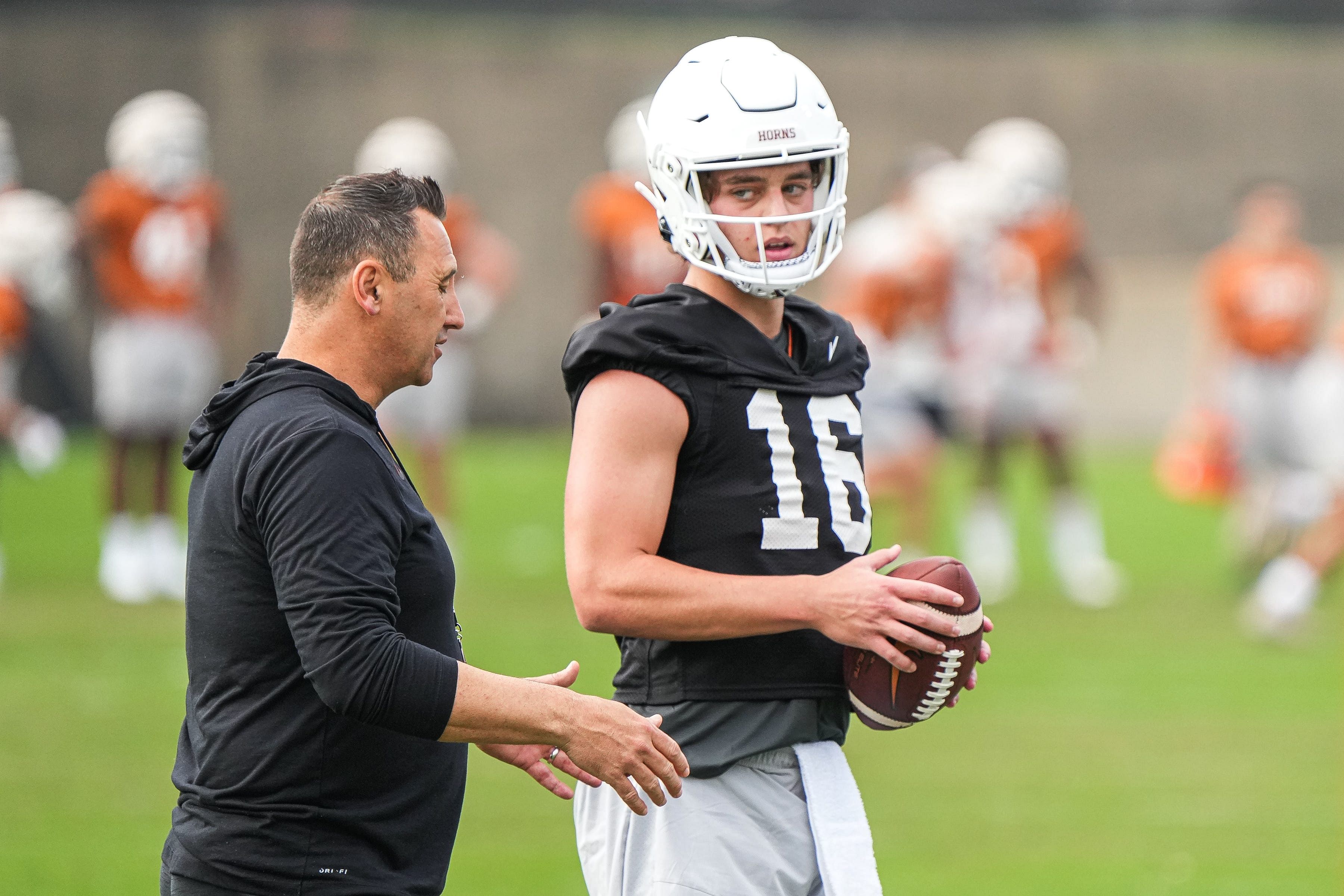 Texas coach Steve Sarkisian (L) with QB Arch Manning - Source: Imagn