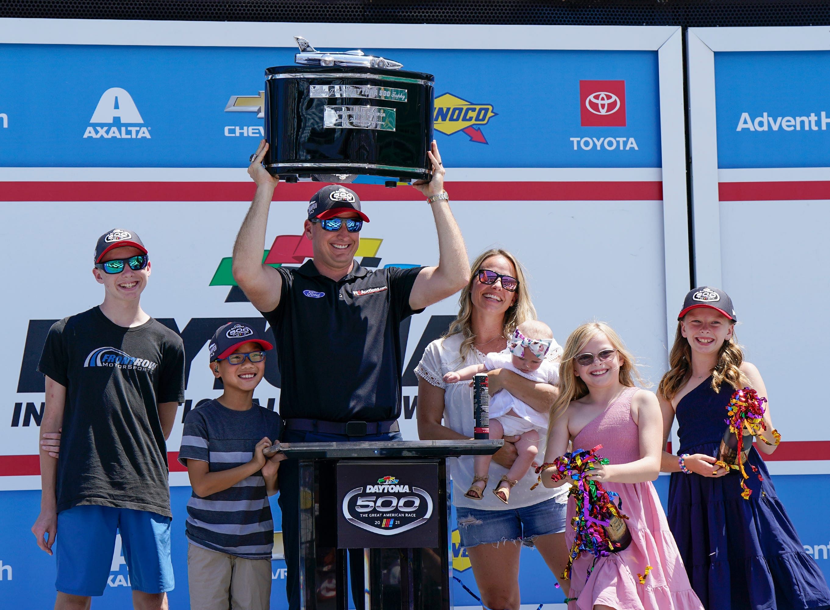 Michael McDowell celebrates 2021 Daytona 500 win with his family in Victory Lane at Daytona International Speedway - Source: Imagn