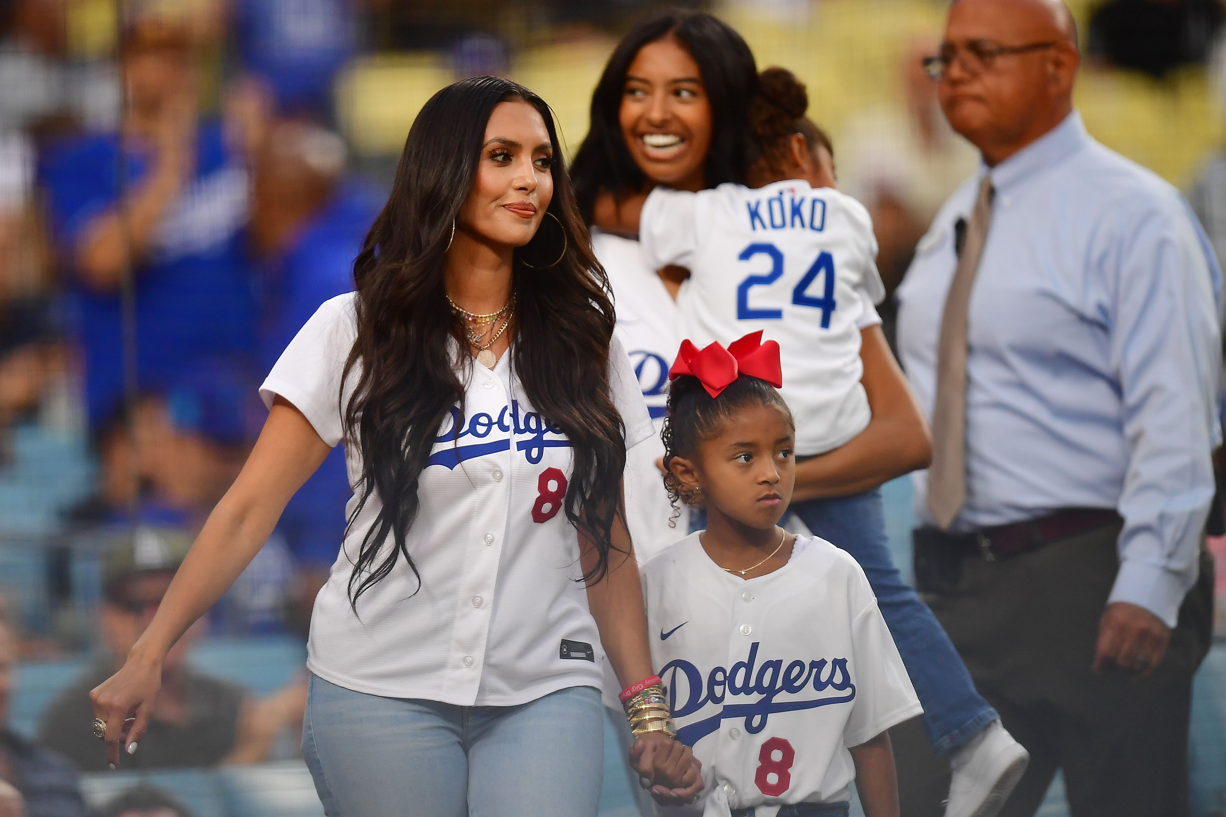 Vanessa Bryant, wife of former Los Angeles Lakers player Kobe Bryant in attendance with daughters Natalia, Bianka and Capri at Dodger Stadium. Photo Credit: Imagn