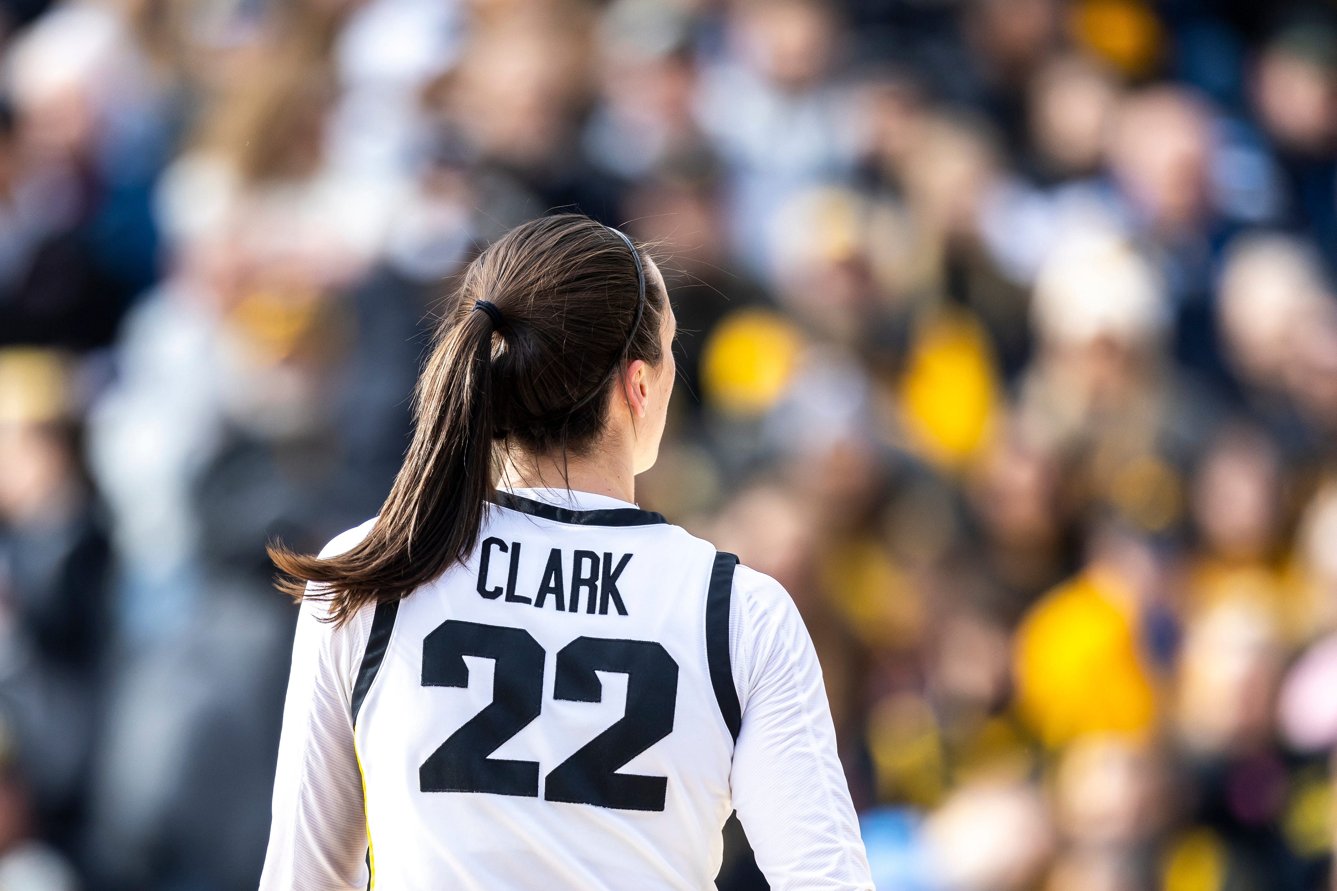 Iowa guard Caitlin Clark looks into the crowd during the Crossover at Kinnick women&#039;s basketball scrimmage between Iowa and DePaul. Photo Credit: Imagn