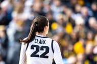 Iowa guard Caitlin Clark looks into the crowd during the Crossover at Kinnick women's basketball scrimmage between Iowa and DePaul. Photo Credit: Imagn