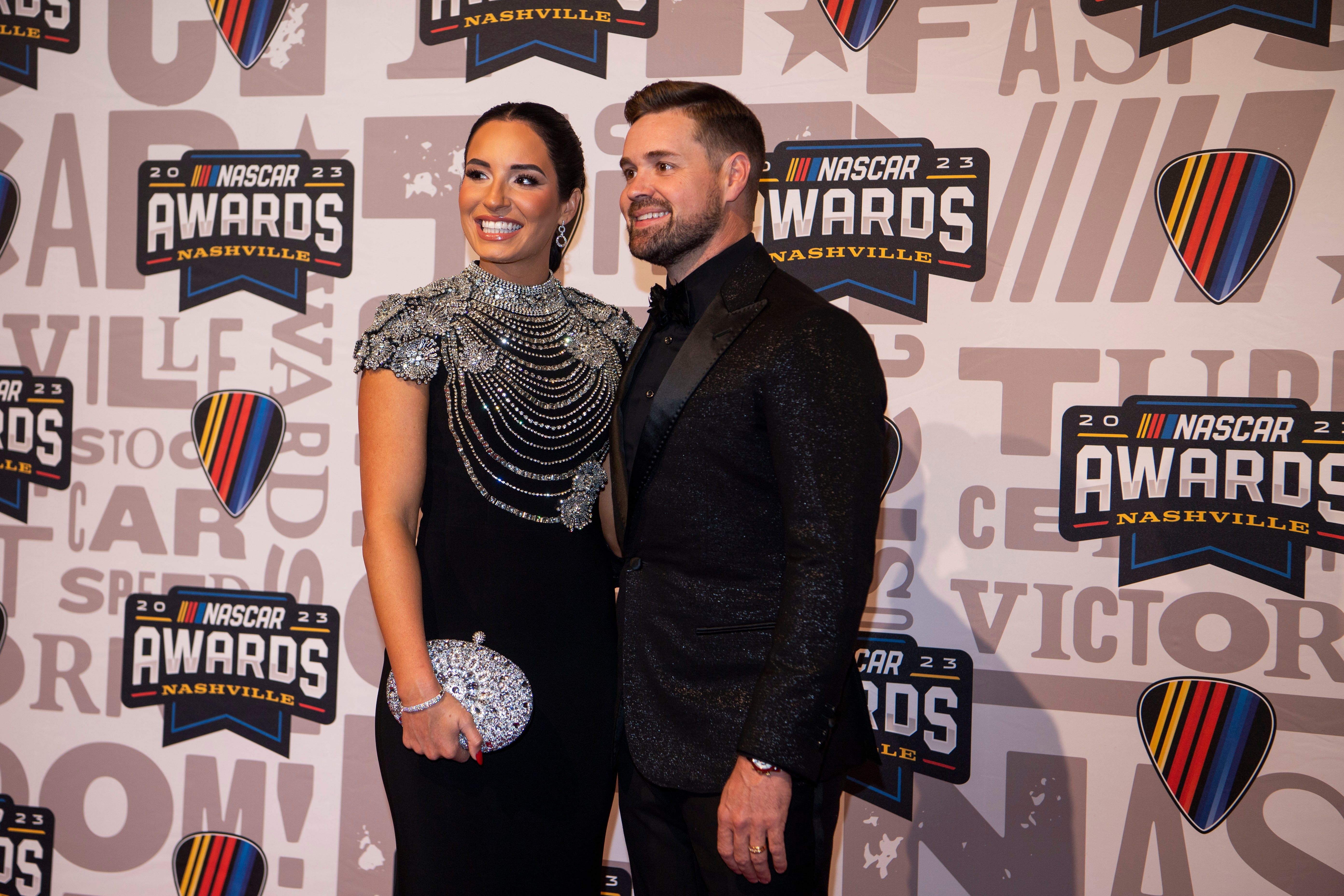 Ricky Stenhouse Jr. and his wife Madyson Stenhouse poses on the red carpet for the 2023 NASCAR Awards Banquet at the Music City Center in Nashville, Tenn., Thursday, Nov. 30, 2023. - Source: Imagn