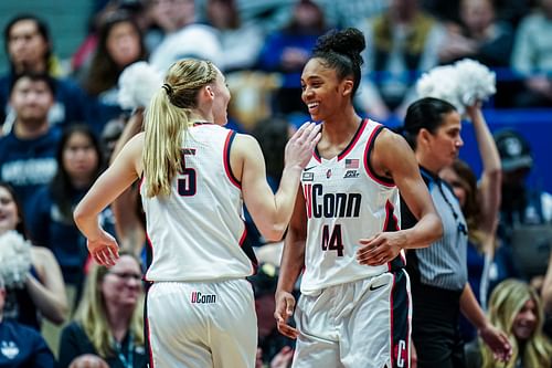 UConn Huskies guard Aubrey Griffin (#44) reacts with guard Paige Bueckers (5) after a play against the Louisville Cardinals in the second half at XL Center. Photo: Imagn