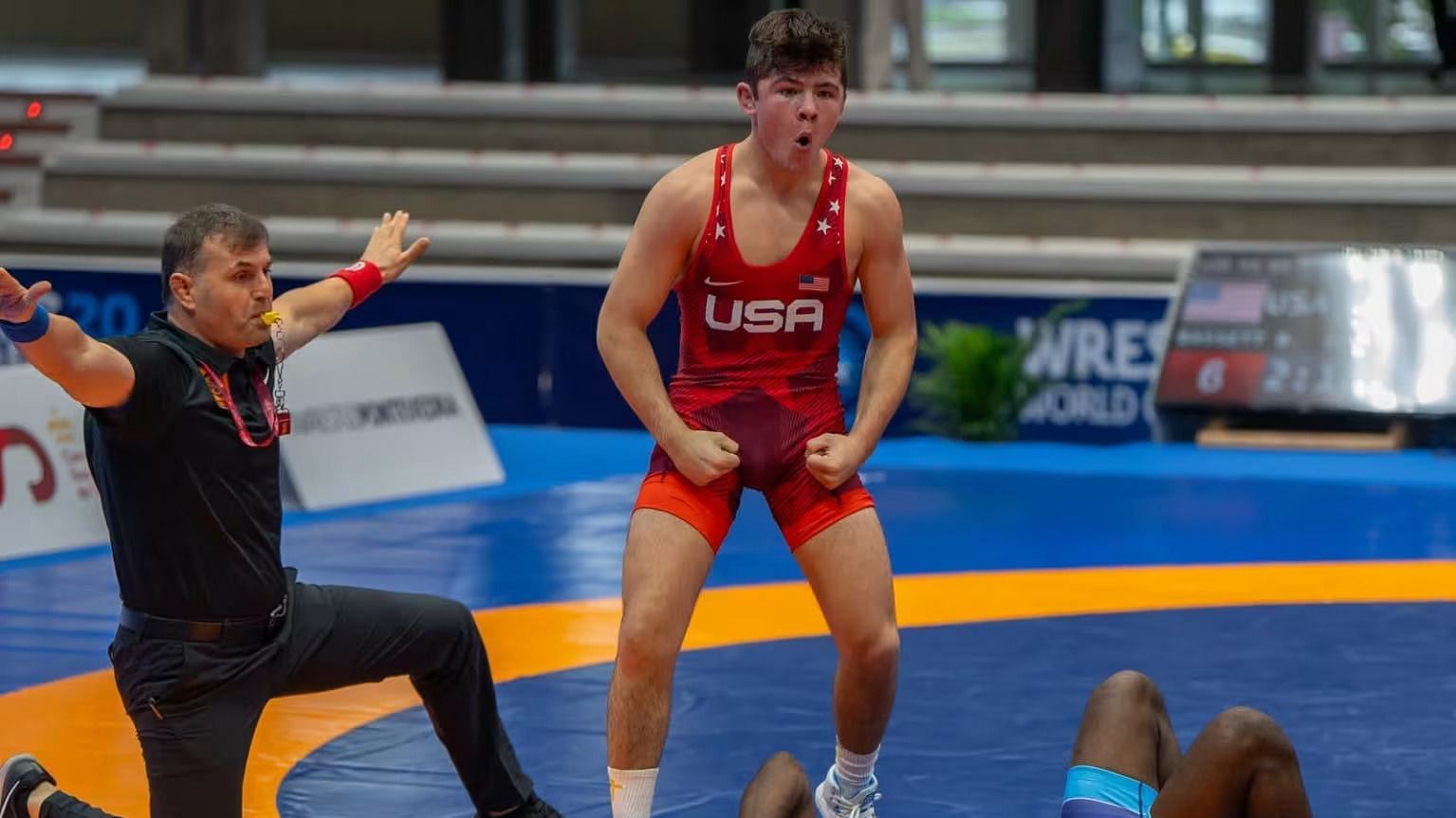 Bo Bassett (USA) pins his quarterfinal opponent to advance to the semifinals at the 2024 U20 World Championships in Pontevedra, Spain - Image via USA Wrestling (themat.com)