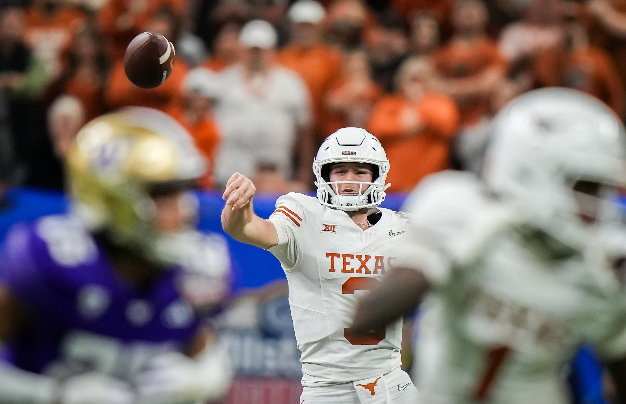 Texas Longhorns quarterback Quinn Ewers (3) sends a pass down the field during the Sugar Bowl College Football Playoff semi-finals at the Ceasars Superdome in New Orleans, Louisiana, Jan. 1, 2024 - Source: Imagn