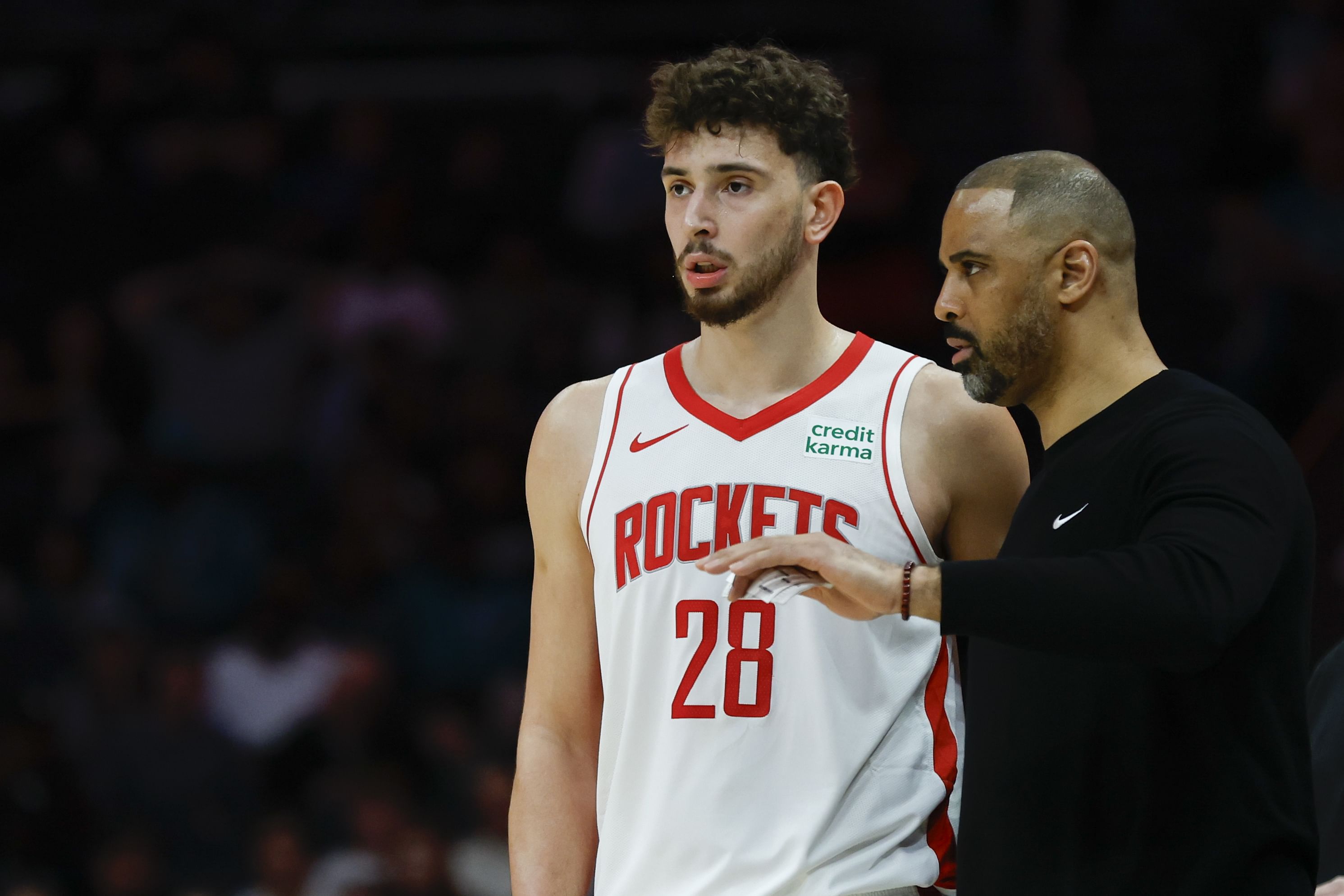 Houston Rockets head coach Ime Udoka, right, talks to Houston Rockets center Alperen Sengun (28). (Credits: IMAGN)