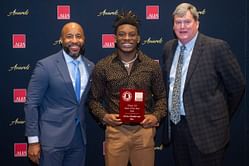 PHOTO: Auburn's Alvin Henderson shows off third Running Back of the Year award following record-breaking high school football season