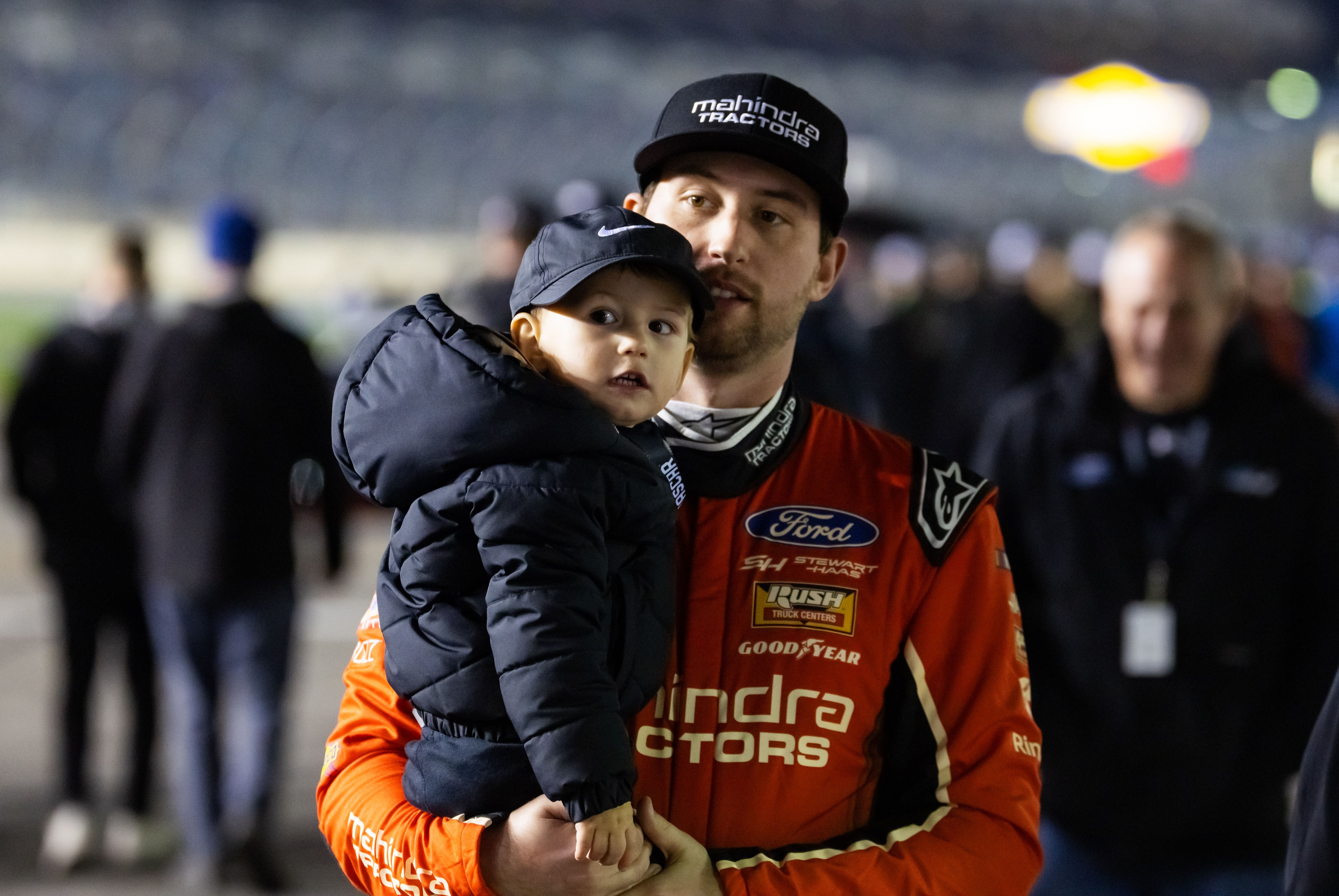 Feb 14, 2024; Daytona Beach, Florida, USA; NASCAR Cup Series driver Chase Briscoe holds his son Brooks Briscoe during qualifying for the Daytona 500 at Daytona International Speedway. Mandatory Credit: Mark J. Rebilas-Imagn Images - Source: Imagn