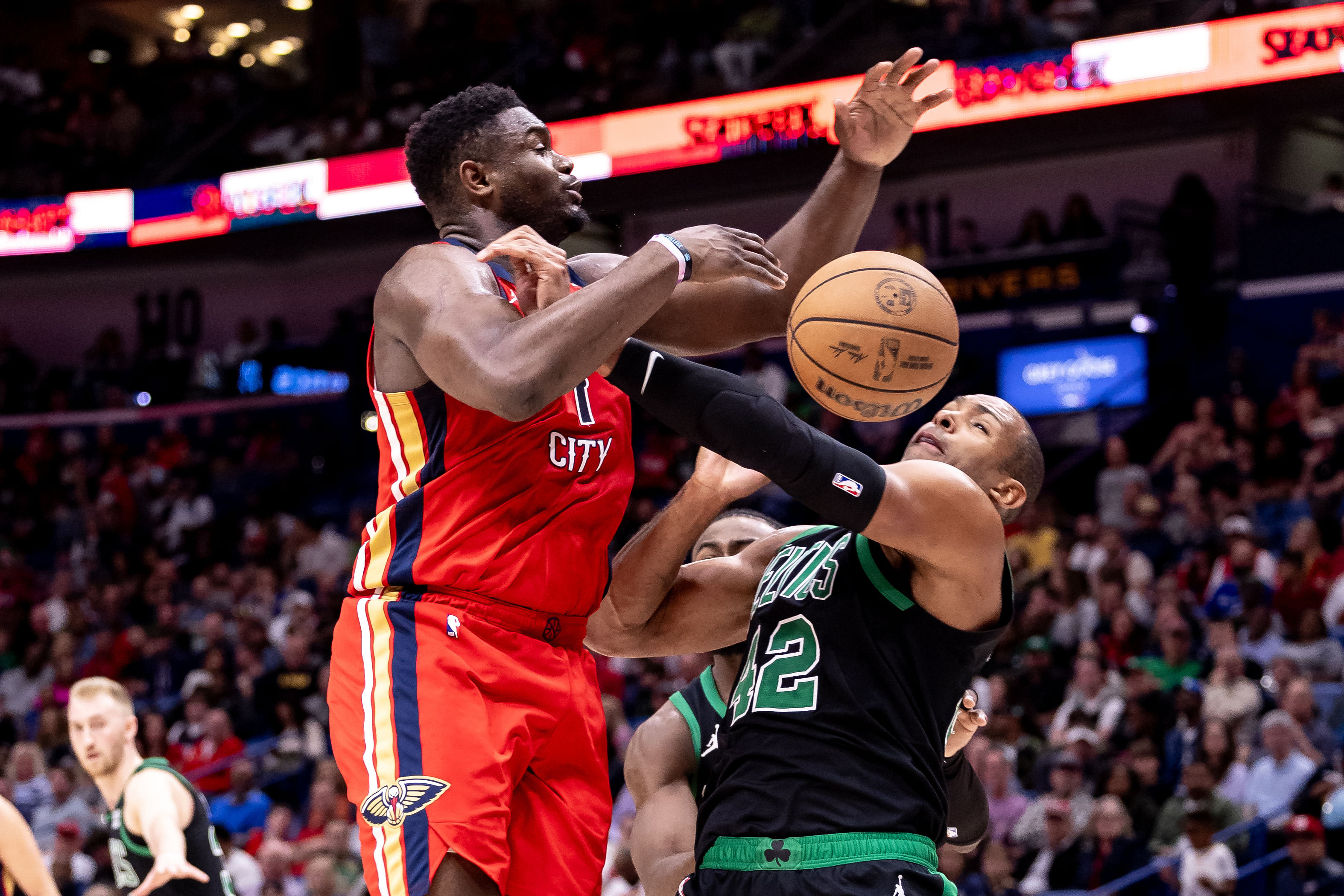 Mar 30, 2024; New Orleans, Louisiana, USA; New Orleans Pelicans forward Zion Williamson (1) has a shot blocked by Boston Celtics center Al Horford (42) during the second half at Smoothie King Center. Mandatory Credit: Stephen Lew-Imagn Images - Source: Imagn