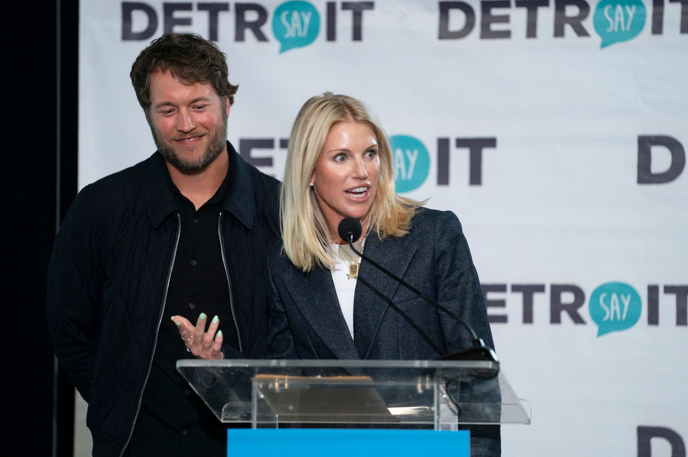 Matthew and Kelly Stafford make remarks before the ribbon cutting for the Kelly and Matthew Stafford and Friends Education Center at the S.A.Y Detroit Play Center in Detroit on Monday, April 1, 2024. Source - Imagn