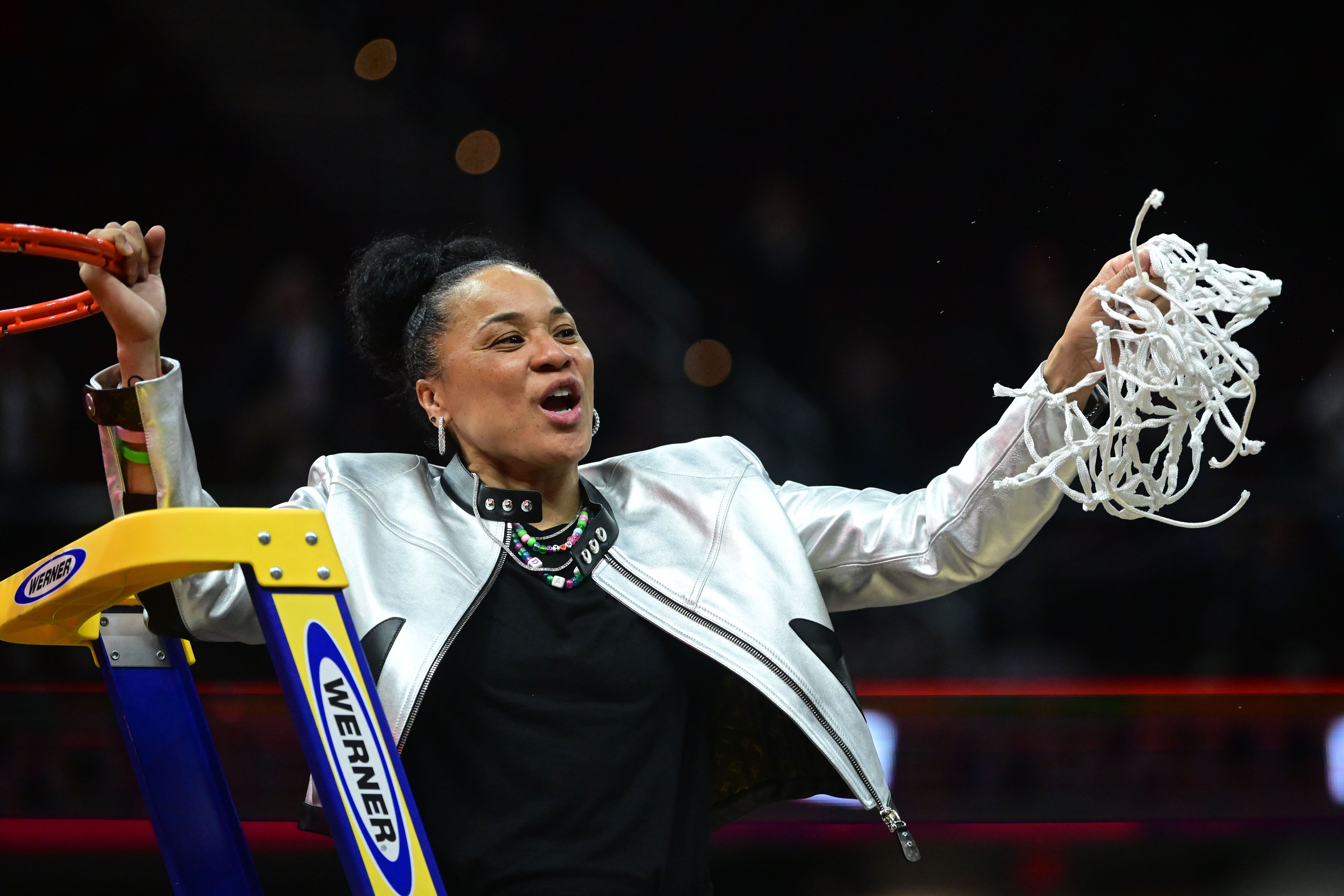 South Carolina Gamecocks head coach Dawn Staley cuts the net after defeating the Iowa Hawkeyes in the 2024 national championship game at Rocket Mortgage FieldHouse. Photo: Imagn