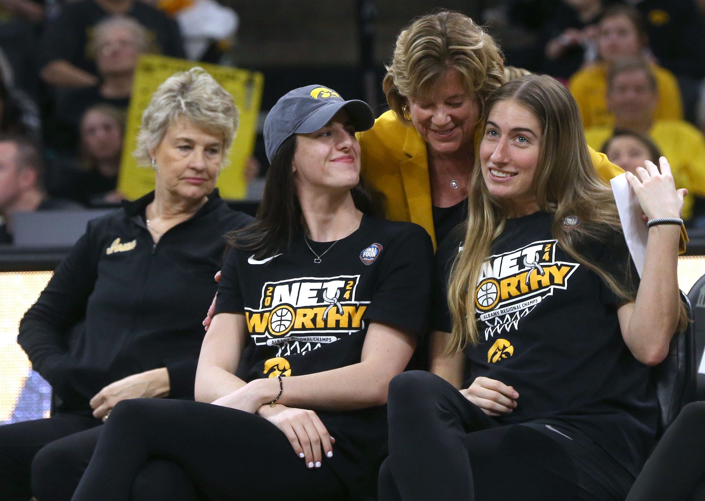 Iowa president Barbara Wilson hugs Caitlin Clark, left, and Kate Martin during a celebration of the Iowa women&rsquo;s basketball team Wednesday, April 10, 2024 at Carver-Hawkeye Arena in Iowa City, Iowa. - Source: Imagn