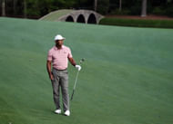 Tiger Woods watches his third shot on No. 13 during the first round of the Masters Tournament. - Source: Imagn