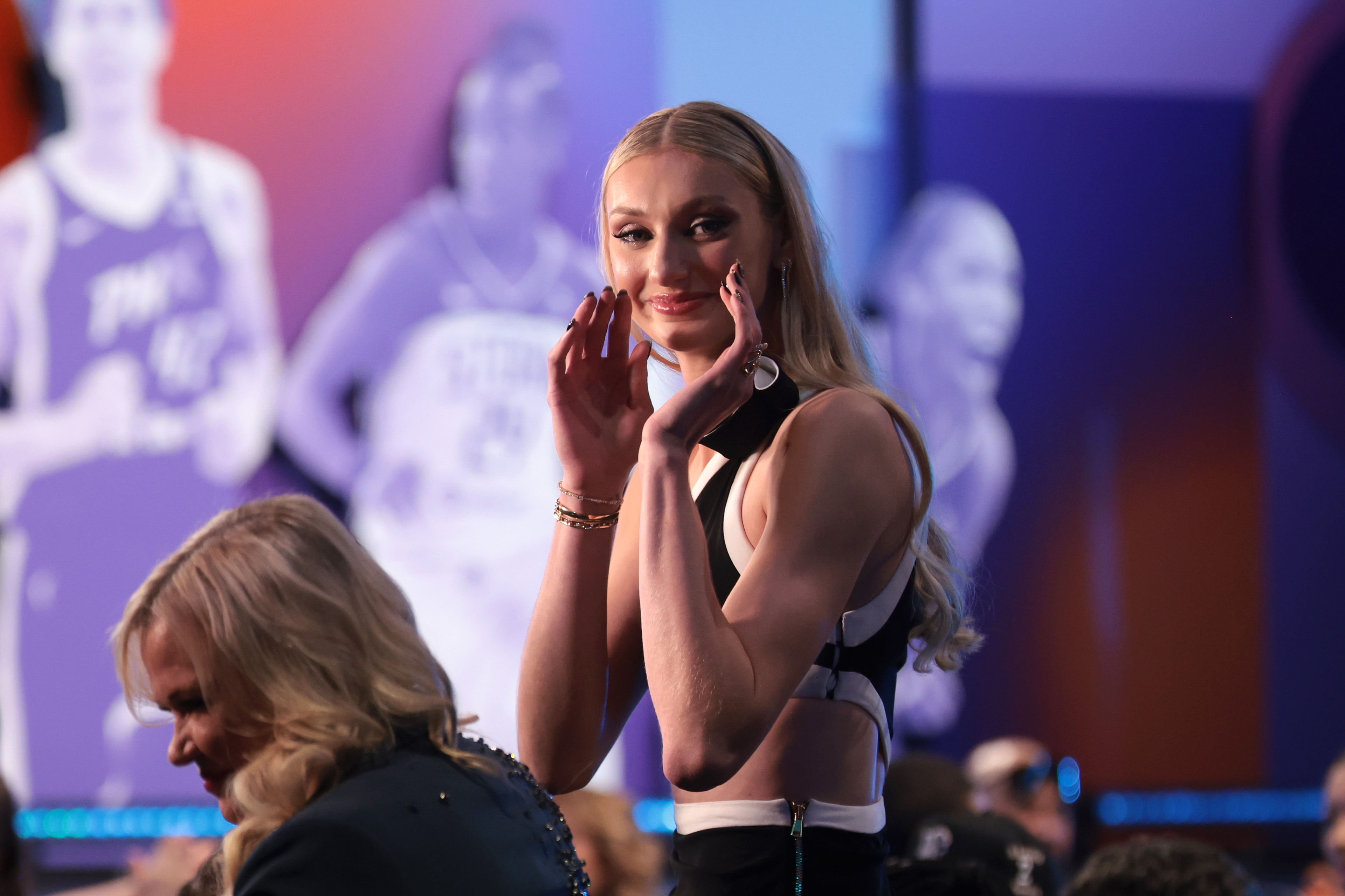 Cameron Brink reacts after she is selected with the number two overall pick to the Los Angeles Sparks in the 2024 WNBA Draft. Photo Credit: Imagn