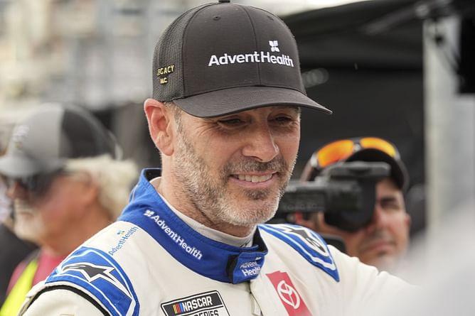 Trackhouse Racing’s Justin Marks drops a picture with Jimmie Johnson amid the Rolex 24 at Daytona