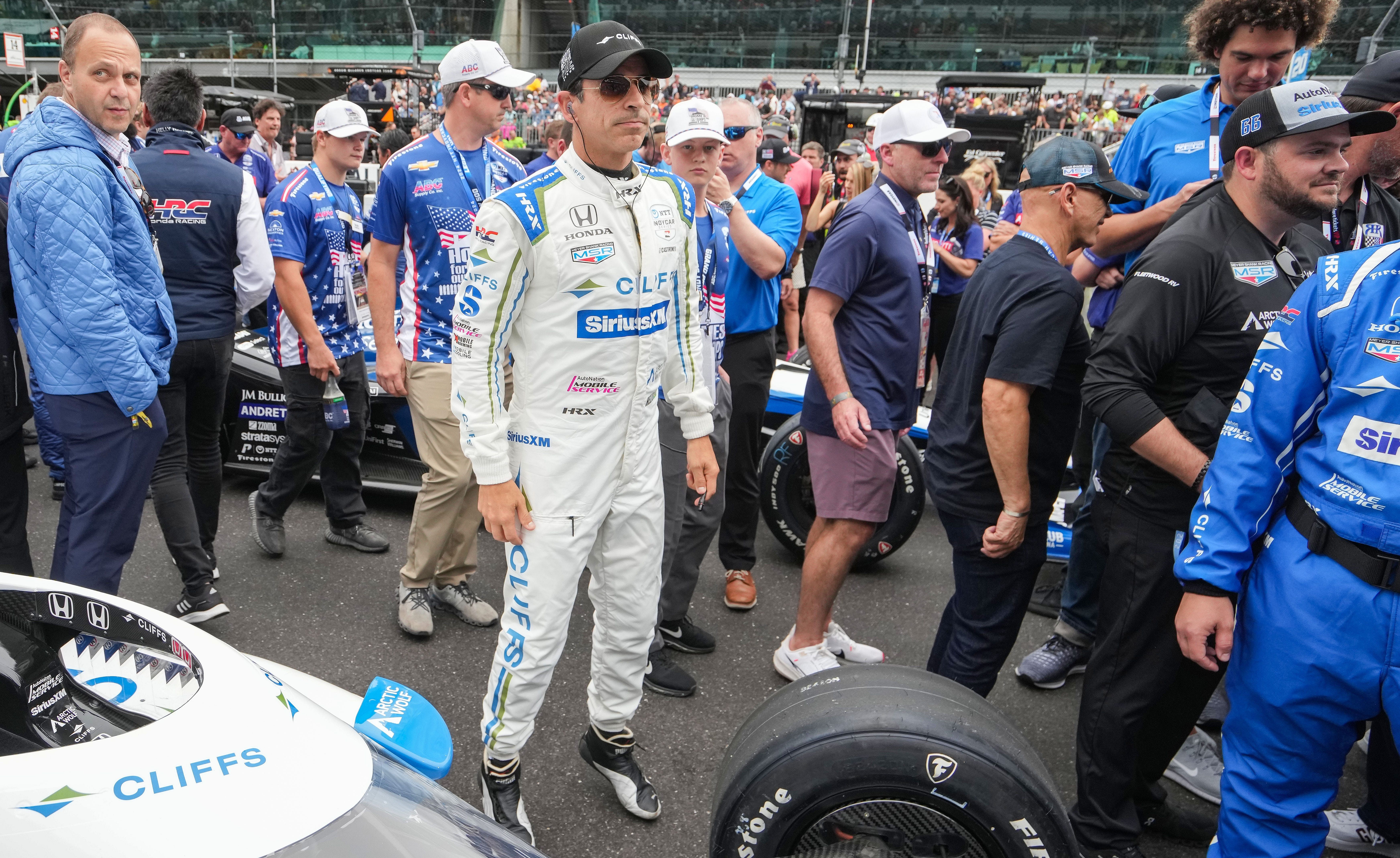 Meyer Shank Racing with Curb-Agajanian driver Helio Castroneves (06) jumps in place next to his car Sunday, May 26, 2024, ahead of the 108th running of the Indianapolis 500 at Indianapolis Motor Speedway.- Source: Imagn