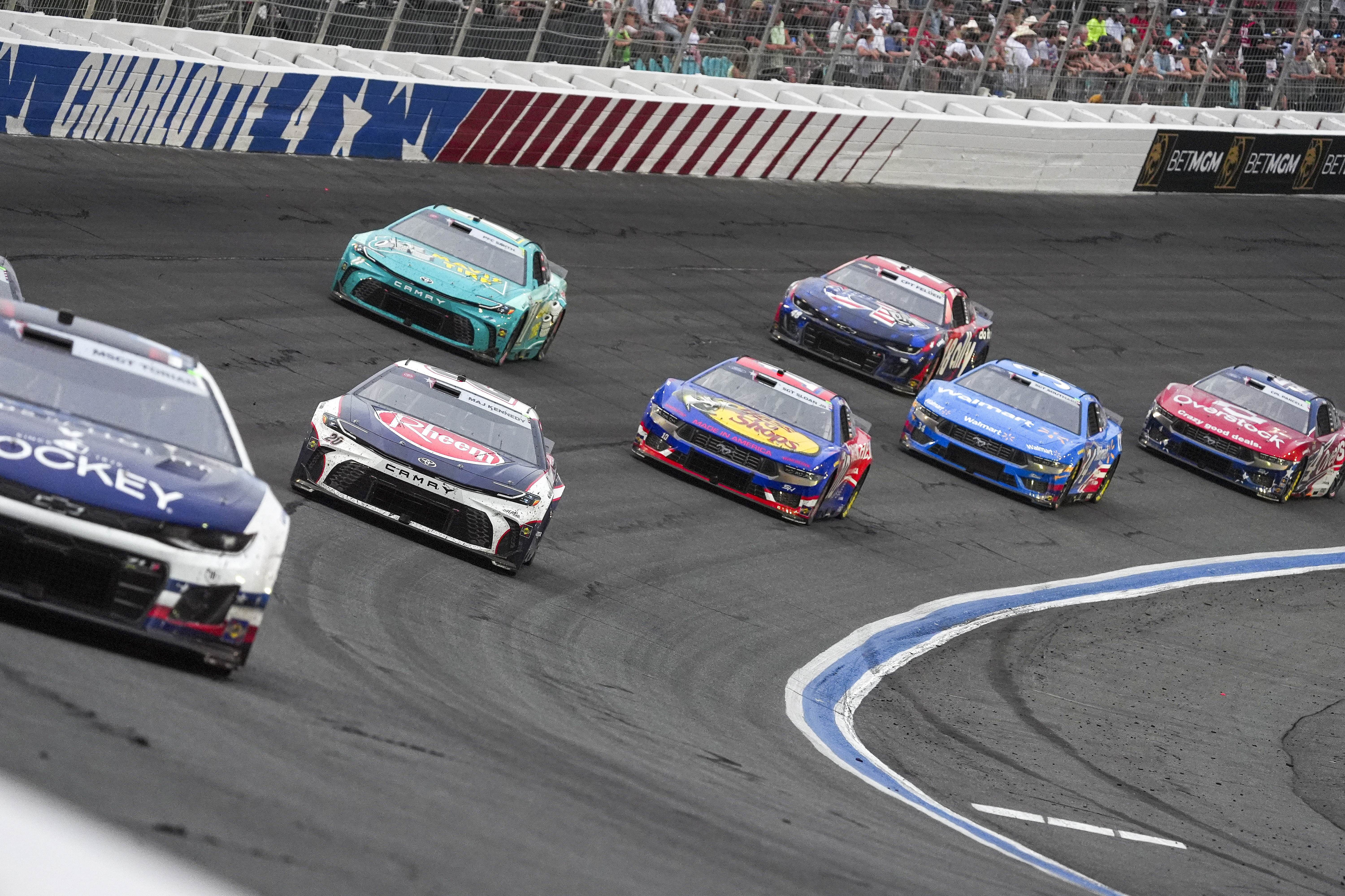 NASCAR Cup Series driver Ross Chastain, chased by driver Christopher Bell at Charlotte Motor Speedway. - Source: Imagn