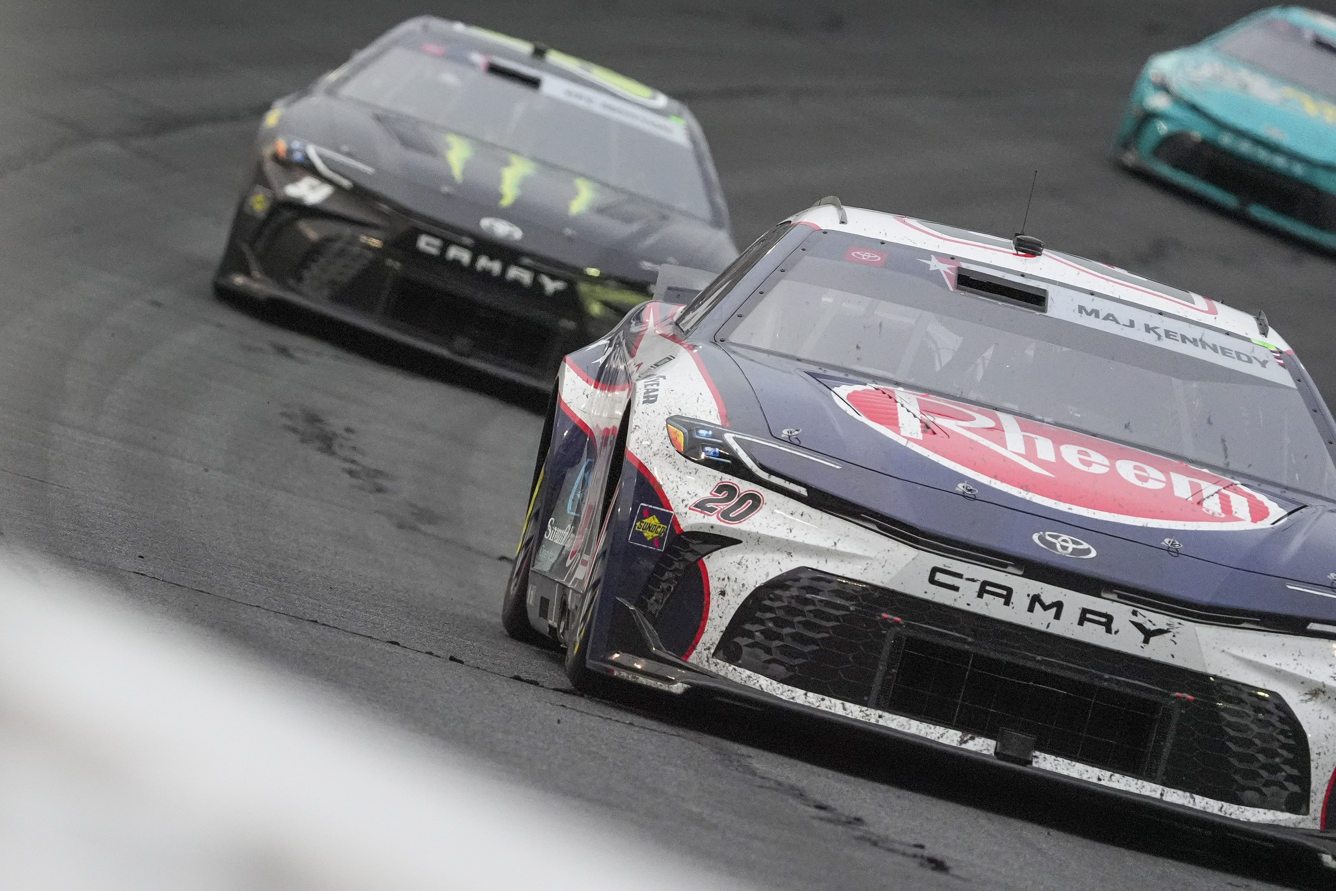 Christopher Bell (20) passes driver Ty Gibbs (54) at Charlotte Motor Speedway - Source: Imagn