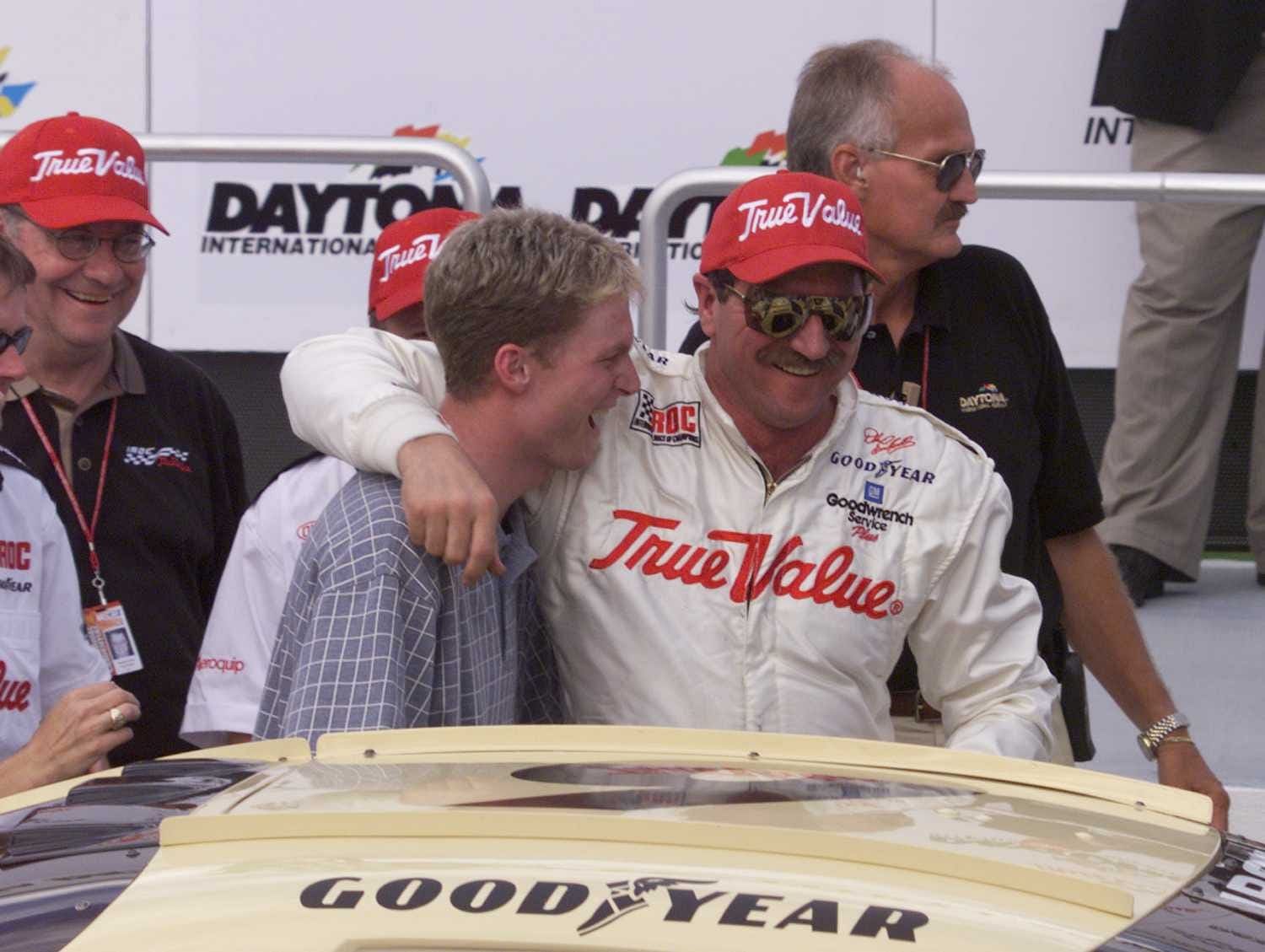 Dale Earnhardt hugs his son, Dale Earnhardt, Jr., in victory lane after winning the International Race of Champions on Feb. 12, 1999 at Daytona International Speedway in Daytona, FL on Friday Feb. 12, 1999. - Source: Imagn