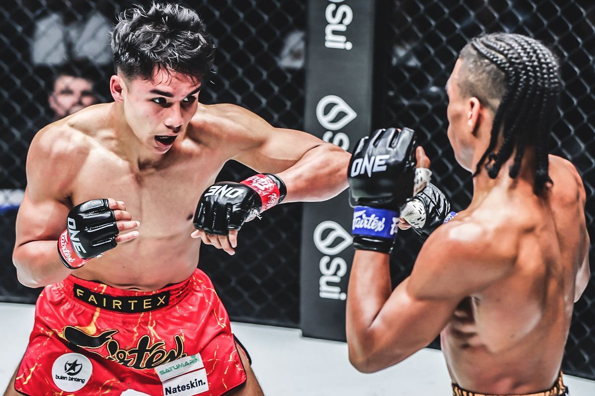 Johan Ghazali fighting Johan Estupinan at ONE 170. [Photo via: ONE Championship]