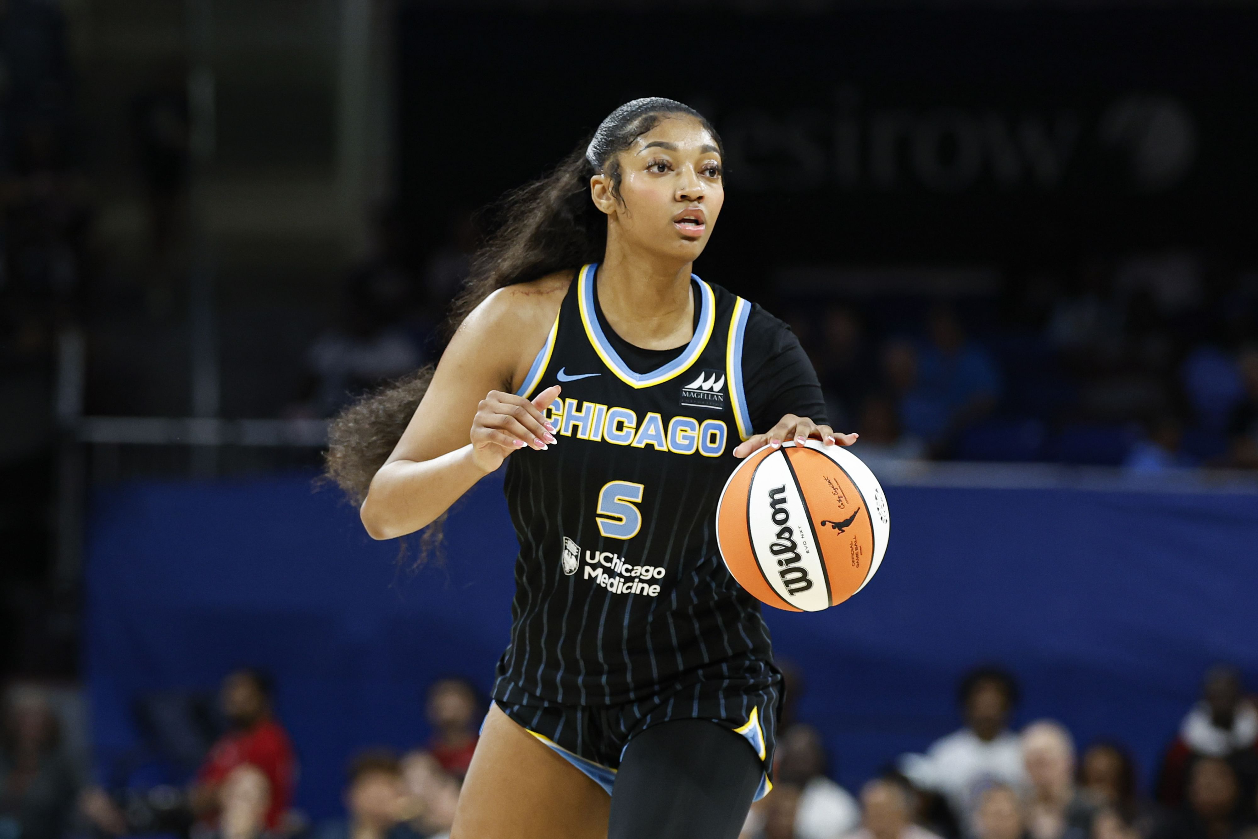 Chicago Sky forward Angel Reese looks to pass the ball against the Las Vegas Aces at Wintrust Arena. Photo Credit: Imagn