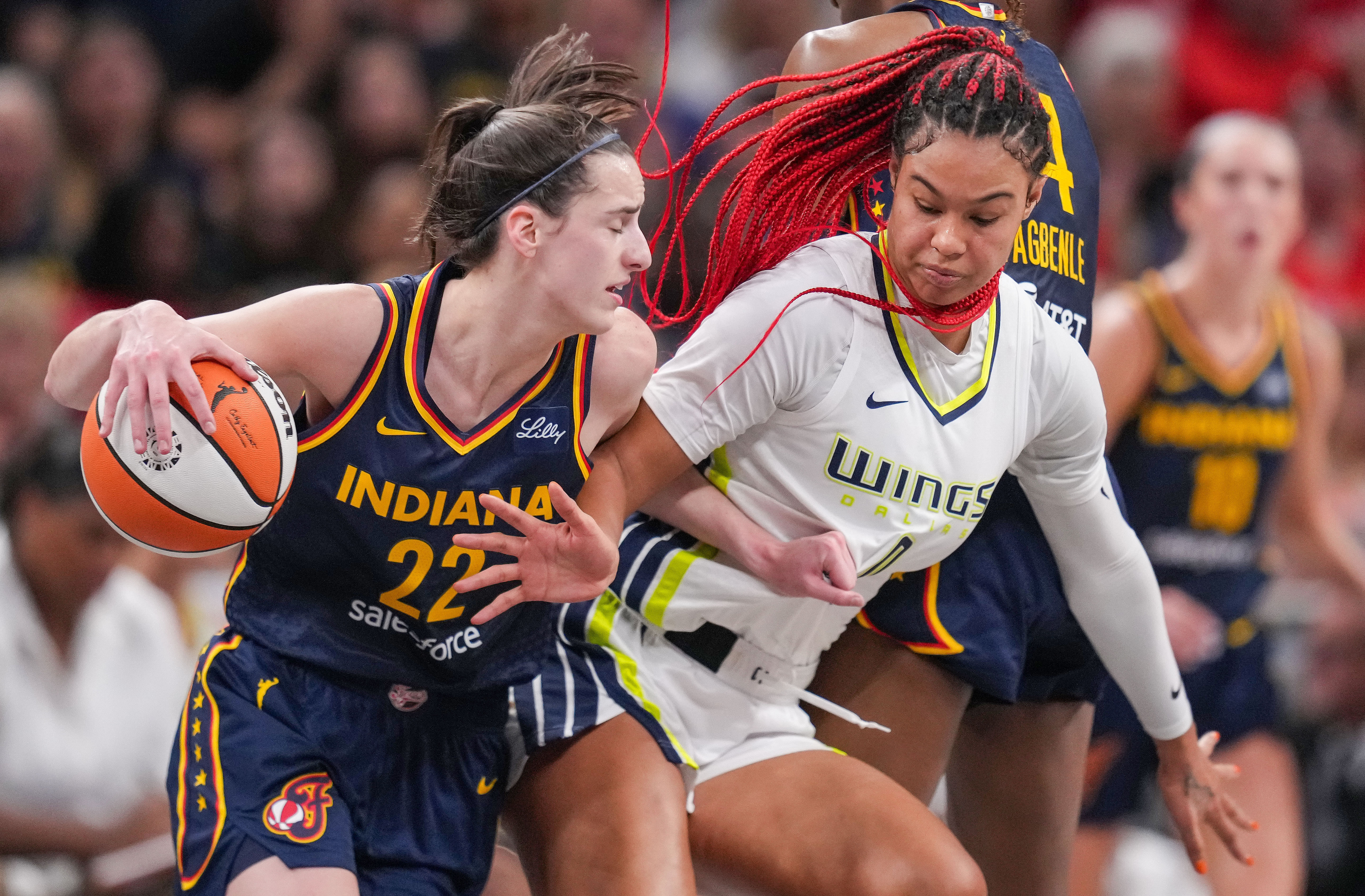 Sep 15, 2024; Indianapolis, Indiana, USA; Indiana Fever guard Caitlin Clark (22) rushes up the court against Dallas Wings forward Satou Sabally (0) at Gainbridge Fieldhouse. Mandatory Credit: Grace Hollars/USA TODAY Network via Imagn Images - Source: Imagn