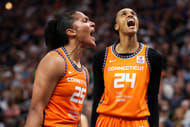 Connecticut Sun forward Alyssa Thomas celebrates her shot with forward DeWanna Bonner at Target Center. Photo Credit: Imagn