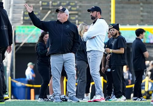 Ohio State Buckeyes head coach Ryan Day talks to offensive coordinator Chip Kelly - Source: Imagn