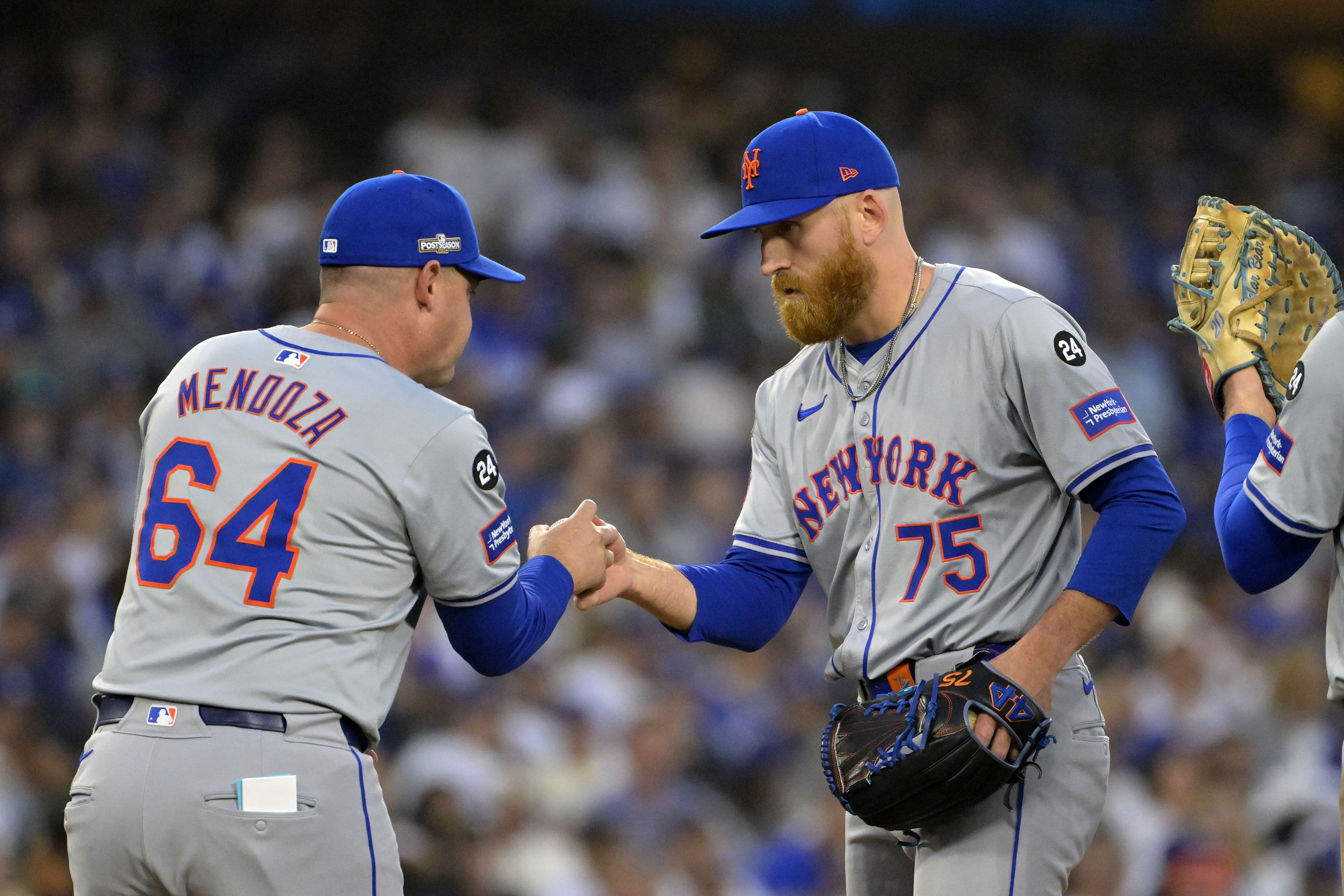 New York Mets - Carlos Mendoza and Reed Garrett (Photo via IMAGN)