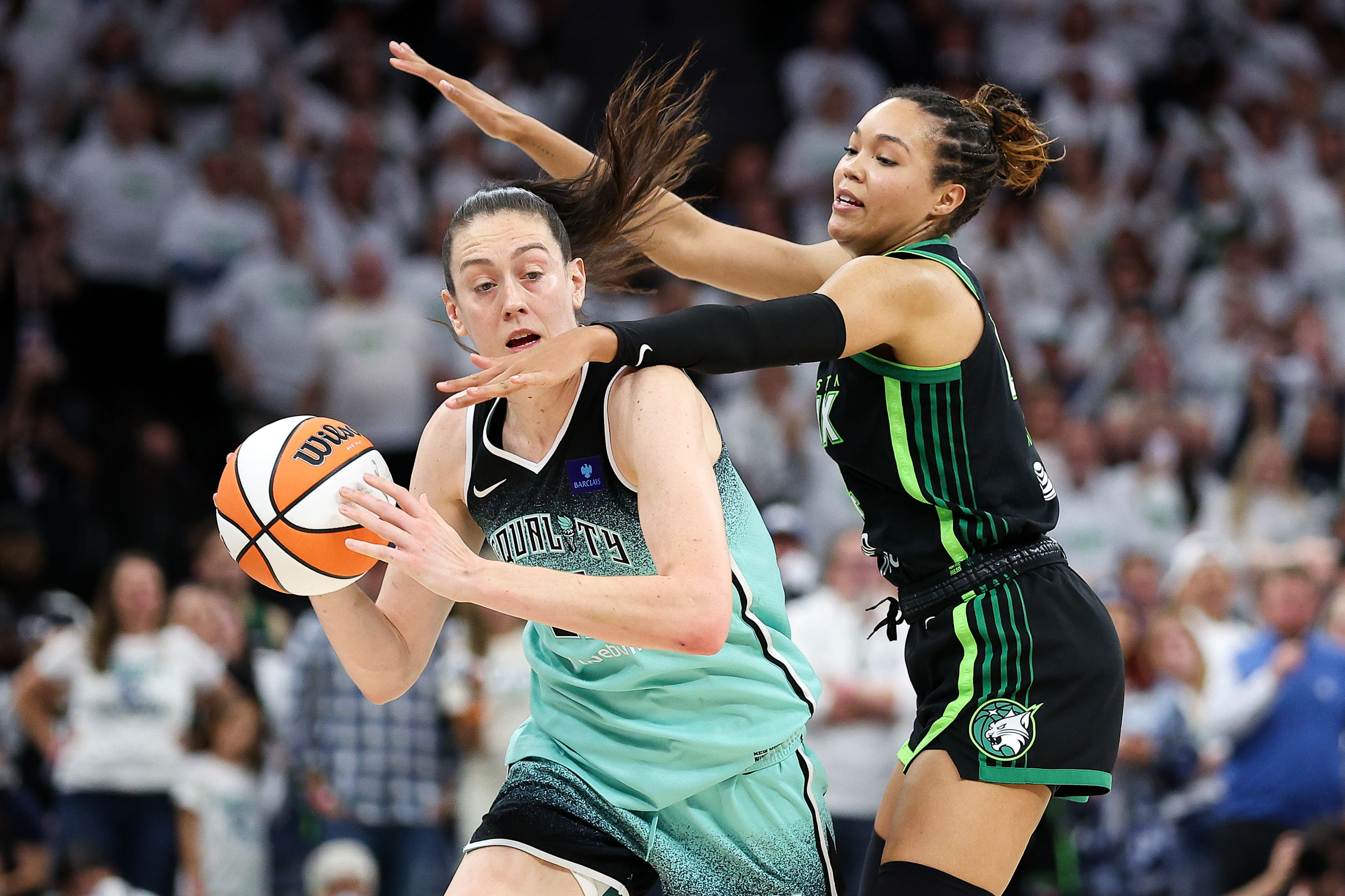 Minnesota Lynx forward Napheesa Collier (#24) defends against New York Liberty forward Breanna Stewart (#30) during the second half of Game Three of the 2024 WNBA Finals at Target Center. Photo: Imagn