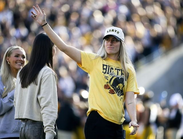 Iowa women&rsquo;s basketball alumn Kate Martin waves to the crowd during an Iowa football game against Northwestern Saturday, Oct. 26, 2024 at Kinnick Stadium in Iowa City, Iowa. - Source: Imagn