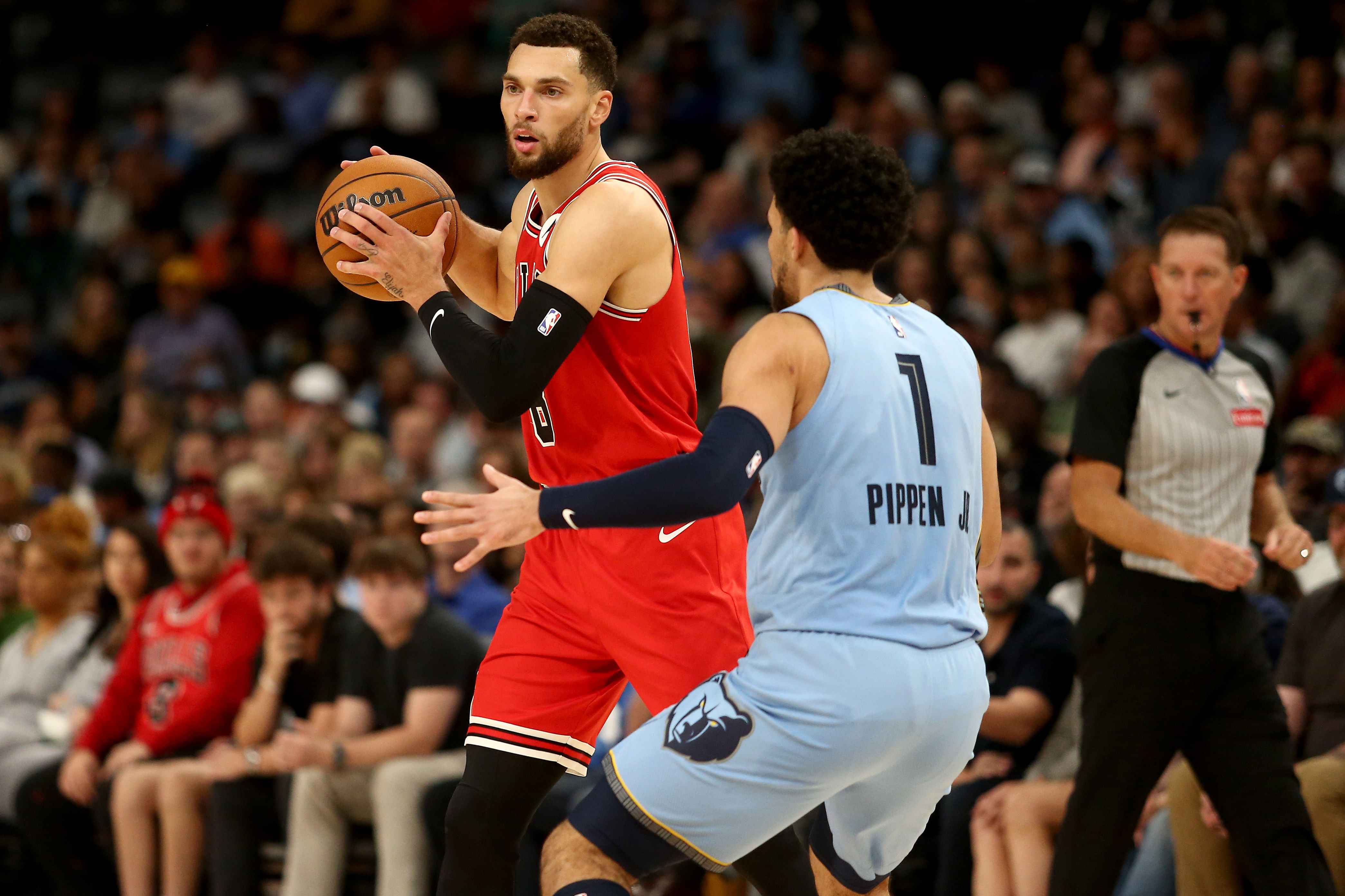 Oct 28, 2024; Memphis, Tennessee, USA; Chicago Bulls guard Zach LaVine (8) handles the ball as Memphis Grizzlies guard Scotty Pippen Jr. (1) defends during the second half at FedExForum. Mandatory Credit: Petre Thomas-Imagn Images - Source: Imagn