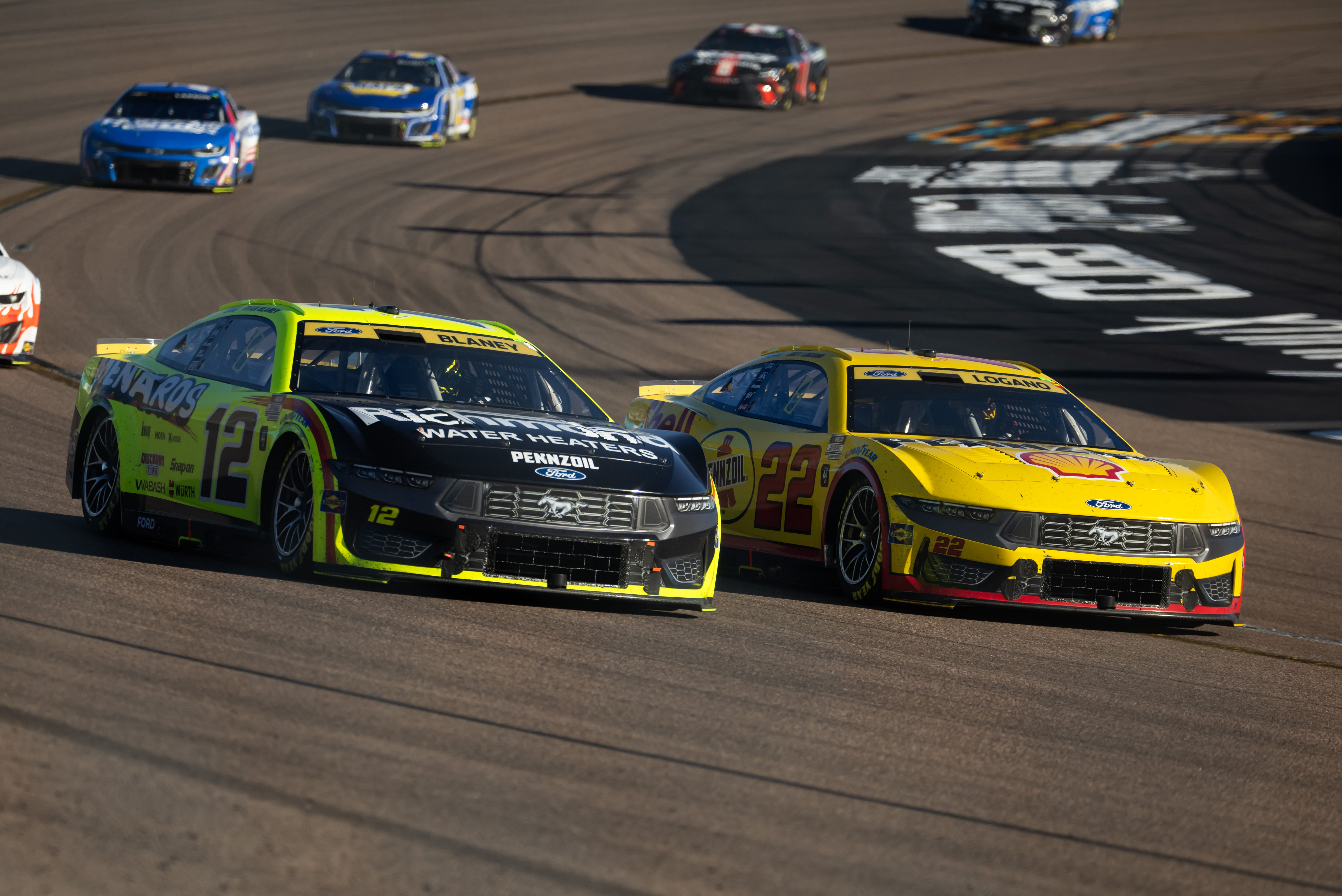 Ryan Blaney (12) and Joey Logano (22) in the season finale at Phoenix Raceway - Source: Imagn