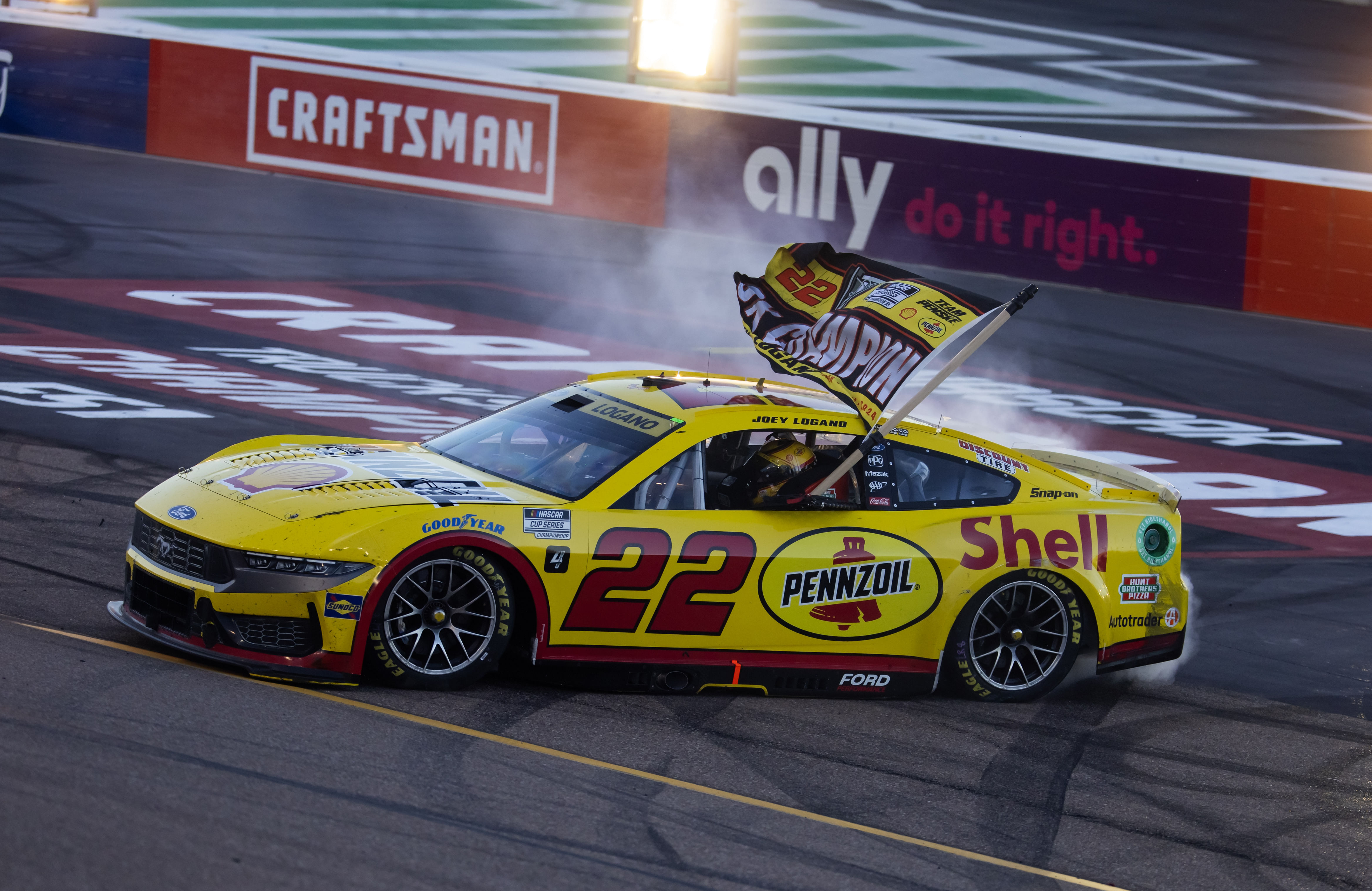  Joey Logano celebrates after winning the 2024 NASCAR Cup Series championship and the NASCAR Cup Series Championship race at Phoenix Raceway. - Source: Imagn