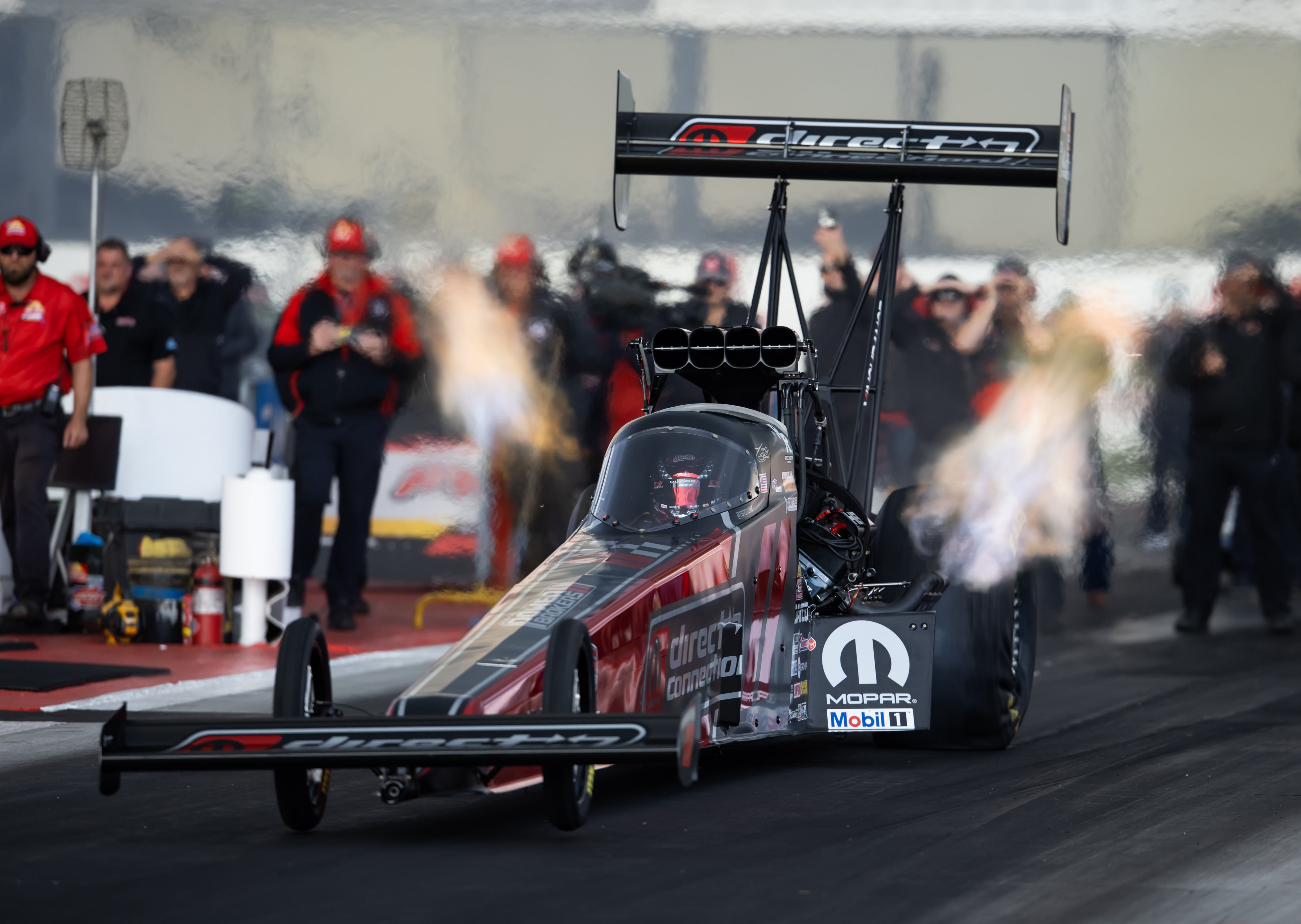 NHRA top fuel driver Tony Stewart during qualifying for the NHRA Finals at In-N-Out Burger Pomona Dragstrip. - Source: Imagn