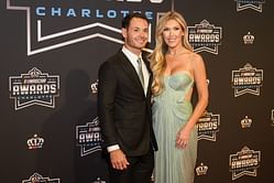 Katelyn Larson shines in a black dress at Kyle Larson’s podium celebration
