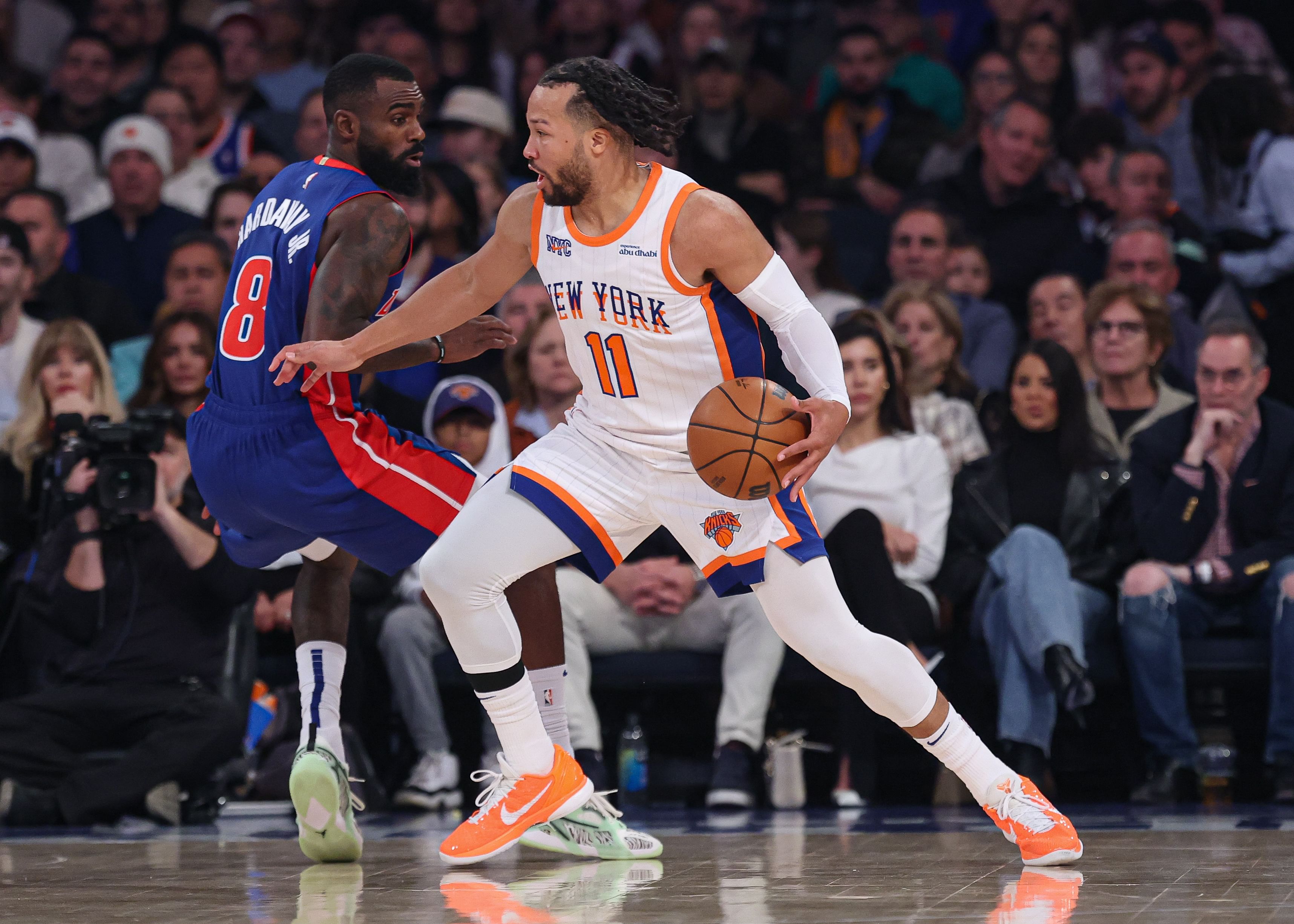 New York Knicks guard Jalen Brunson dribbles as Detroit Pistons forward Tim Hardaway Jr. defends at Madison Square Garden. Photo Credit: Imagn