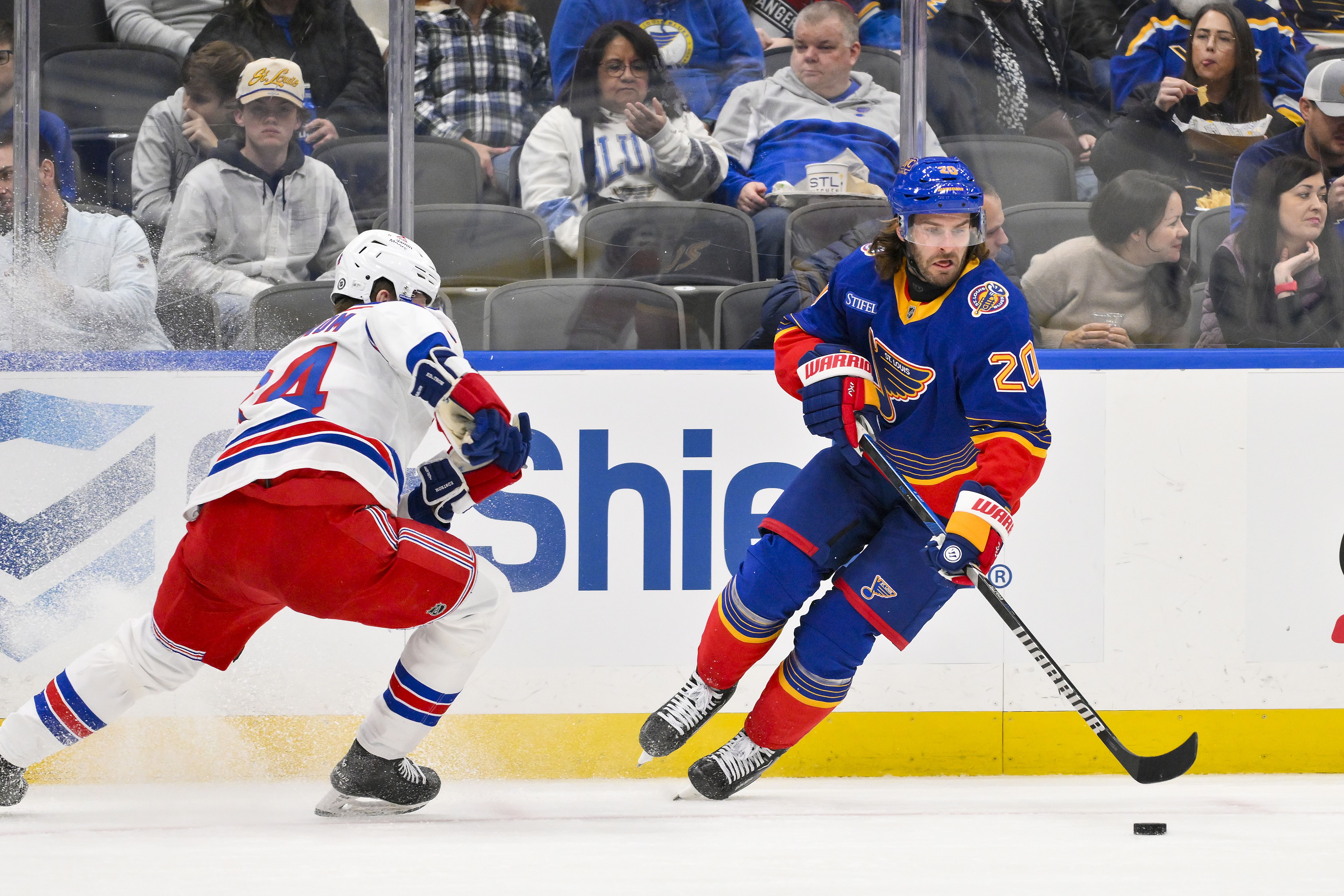 St. Louis Blues left wing Brandon Saad (20) controls the puck during an NHL game. (Credits: IMAGN)