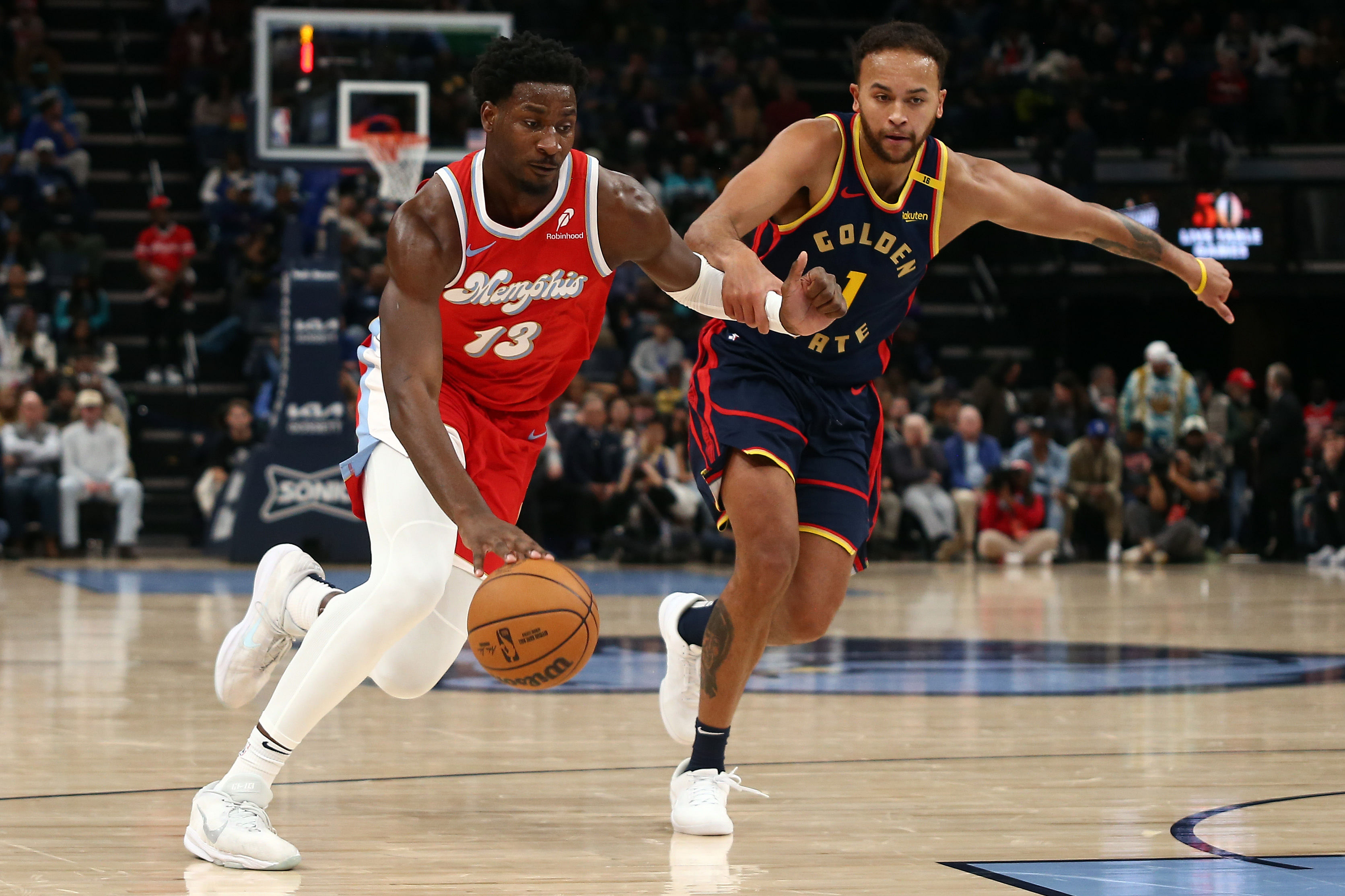 Memphis Grizzlies forward Jaren Jackson Jr. drives to the basket as Golden State Warriors forward Kyle Anderson defends at FedExForum. Photo Credit: Imagn