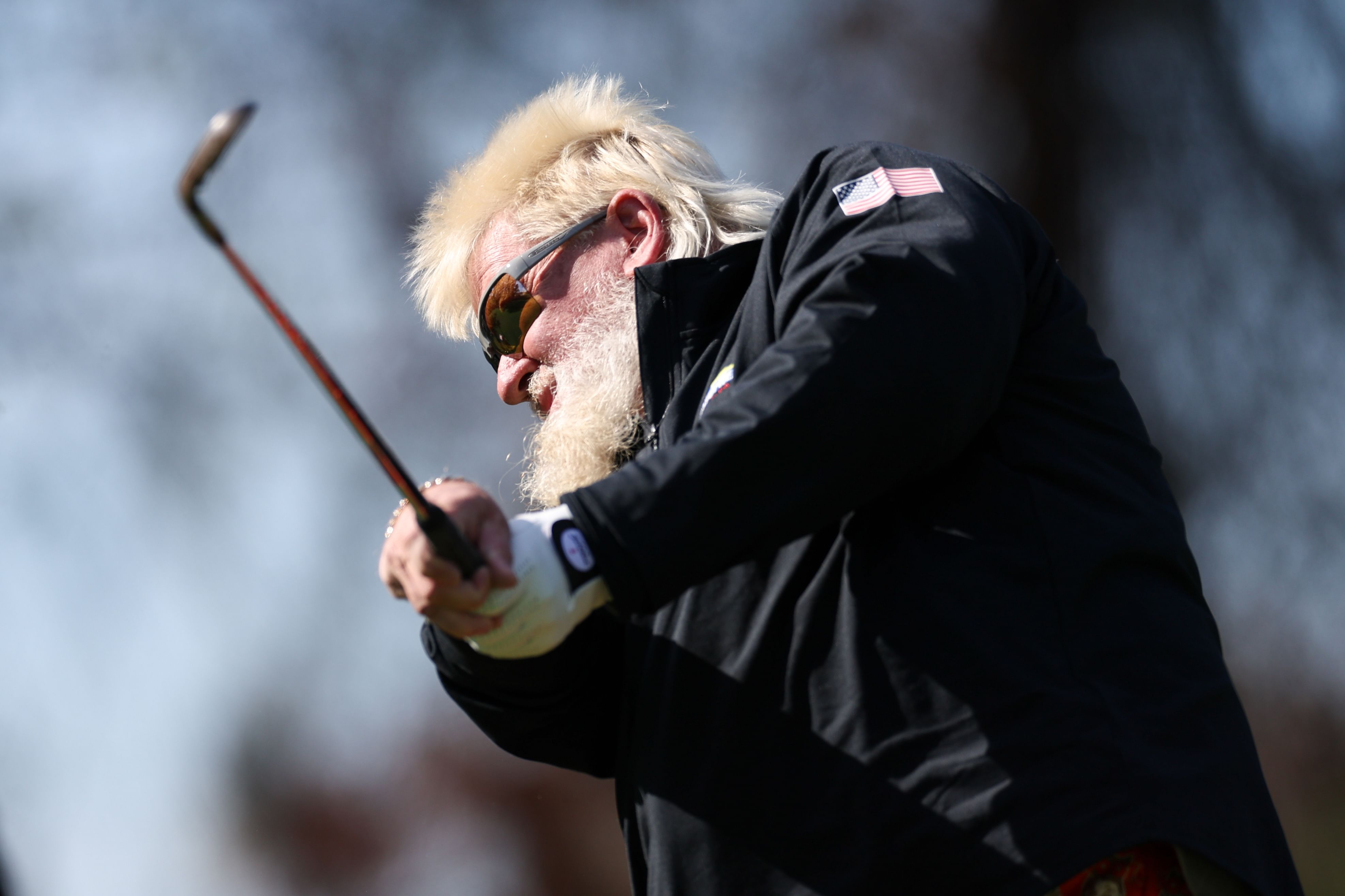 John Daly hits a tee shot from the fourth hole during the PNC Championship at The Ritz-Carlton Golf Club - Source: Imagn