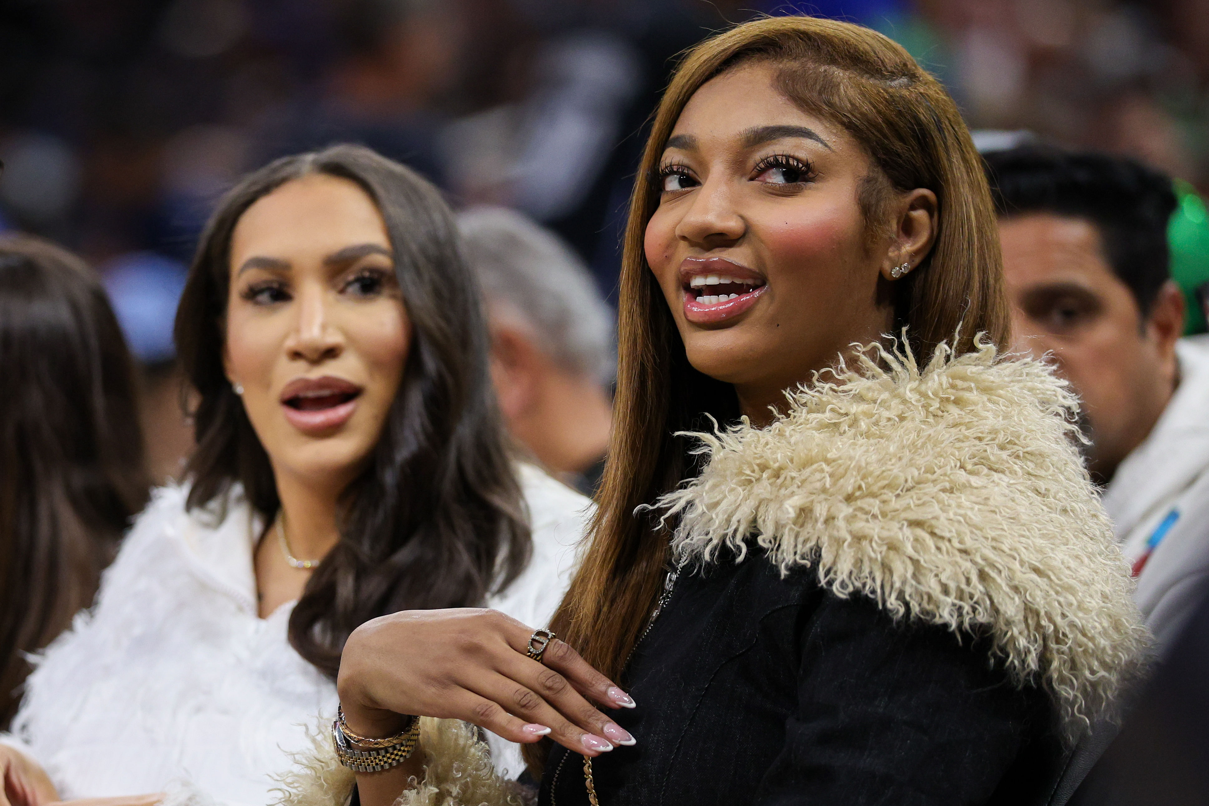 Dec 23, 2024; Orlando, Florida, USA; Chicago Sky forward Angel Reese (5) looks on during a NBA game between the Orlando Magic and Boston Celtics at Kia Center. Mandatory Credit: Nathan Ray Seebeck-Imagn Images - Source: Imagn