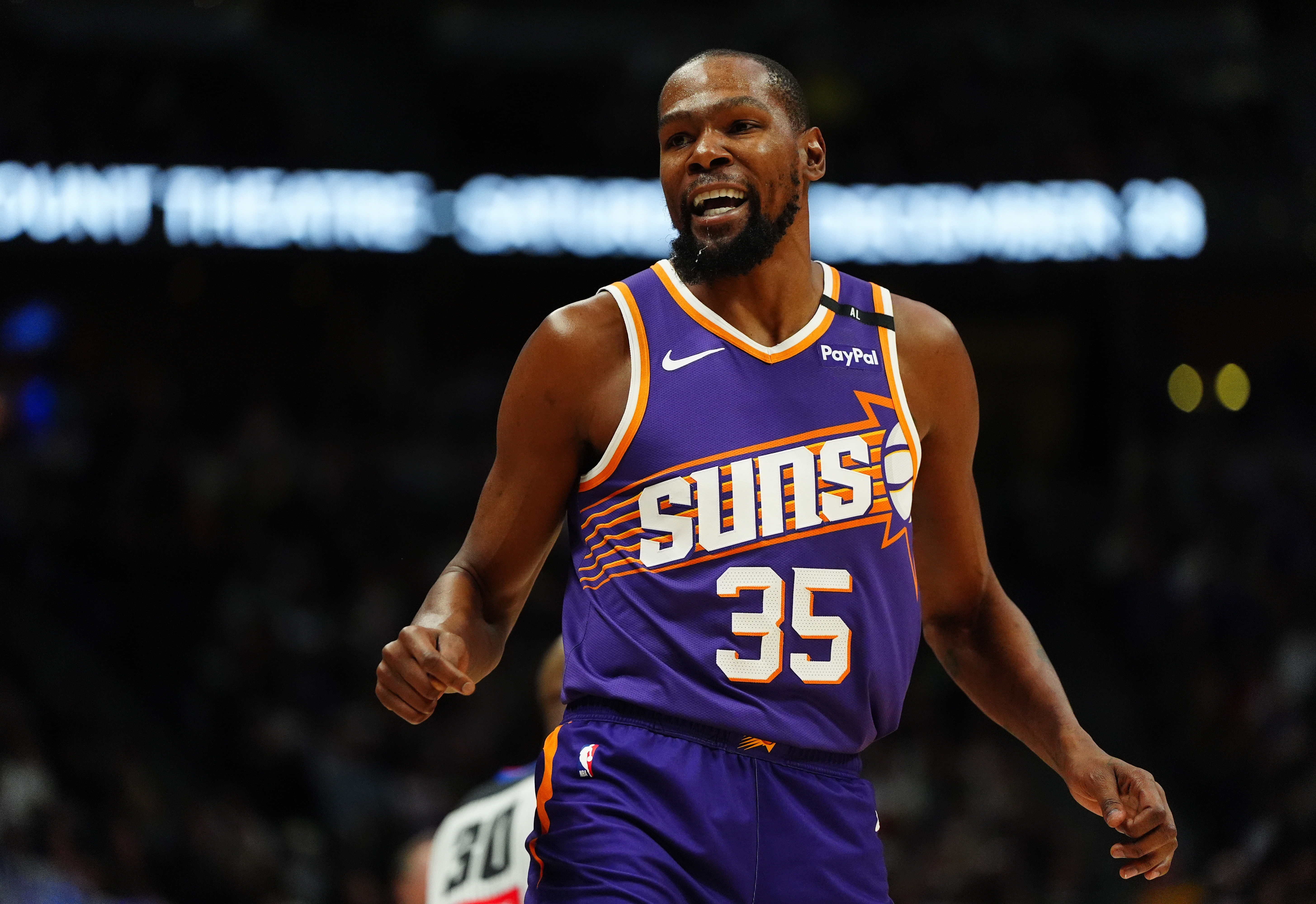 Dec 23, 2024; Denver, Colorado, USA; Phoenix Suns forward Kevin Durant (35) reacts towards the Denver Nuggets bench in the first quarter at Ball Arena. Mandatory Credit: Ron Chenoy-Imagn Images - Source: Imagn