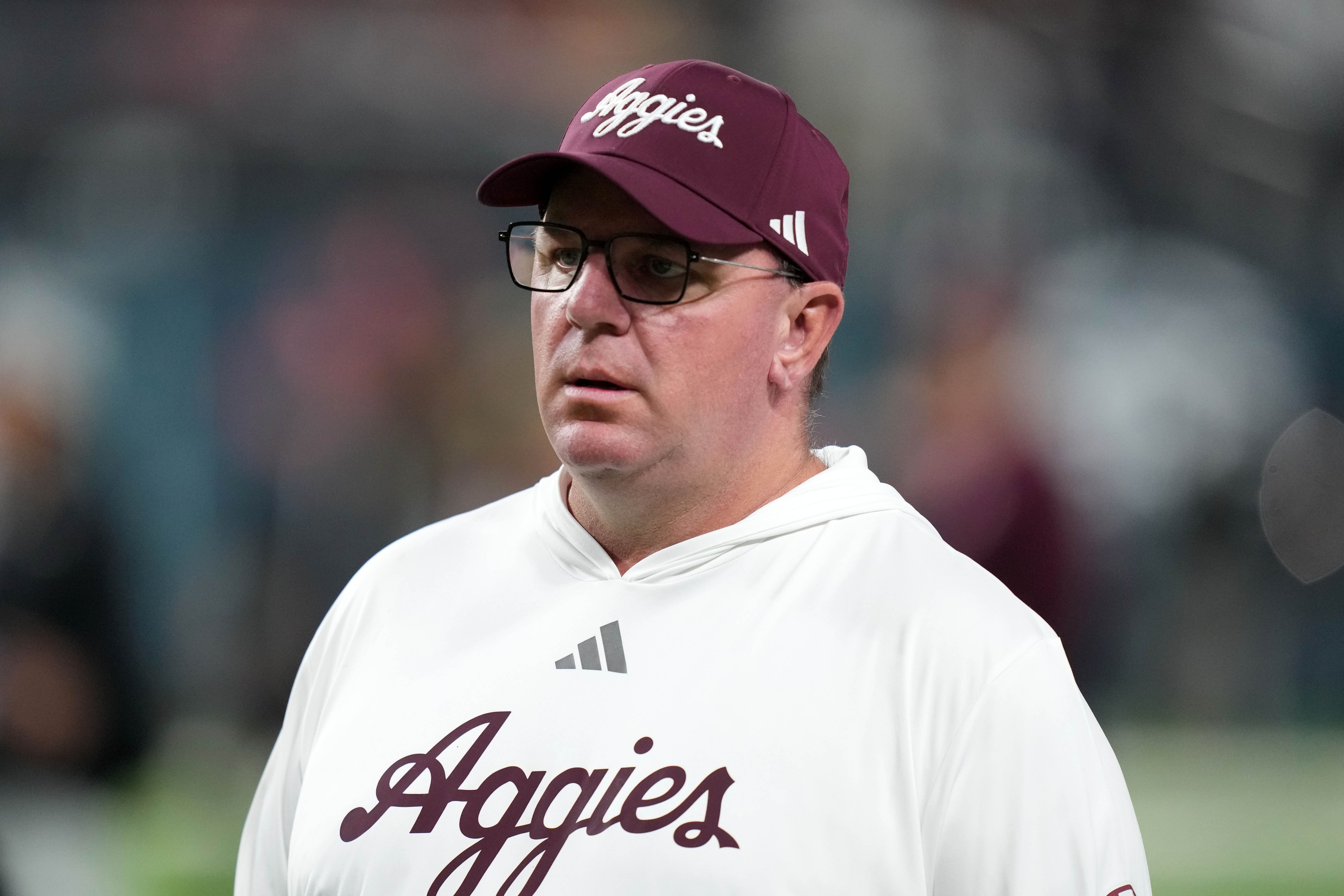 Dec 27, 2024; Las Vegas, NV, USA; Texas A&amp;M Aggies head coach Mike Elko reacts against the Southern California Trojans in the first half at Allegiant Stadium. Mandatory Credit: Kirby Lee-Imagn Images - Source: Imagn