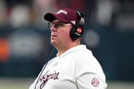 Texas A&M coach Mike Elko will likely miss his two early-entry players (Photo Credit: IMAGN)