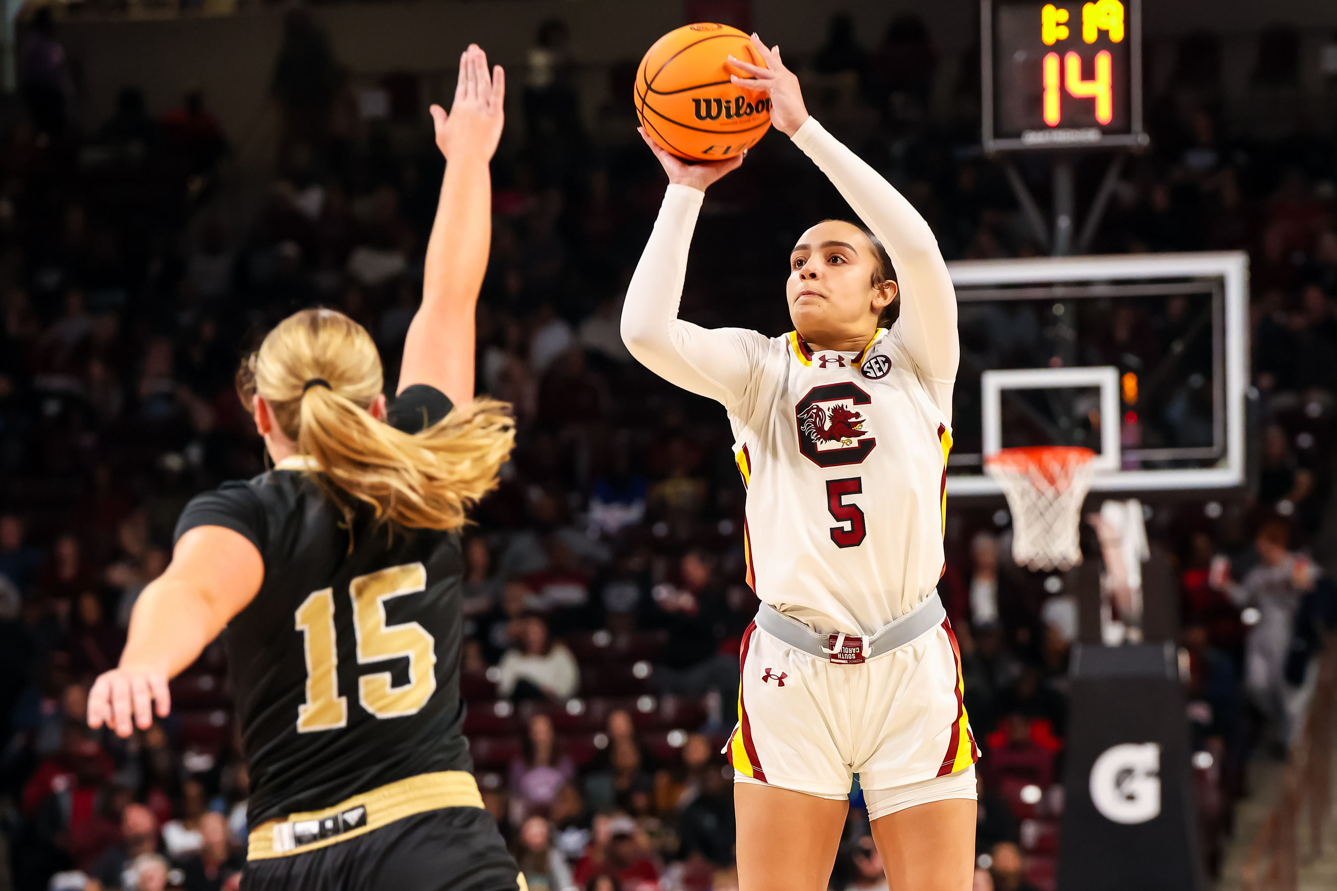 South Carolina Gamecocks guard Tessa Johnson (#5) shoots over Wofford Terriers guard Molly Masingale (#15) in the first half of their NCAA game at Colonial Life Arena. Photo: Imagn