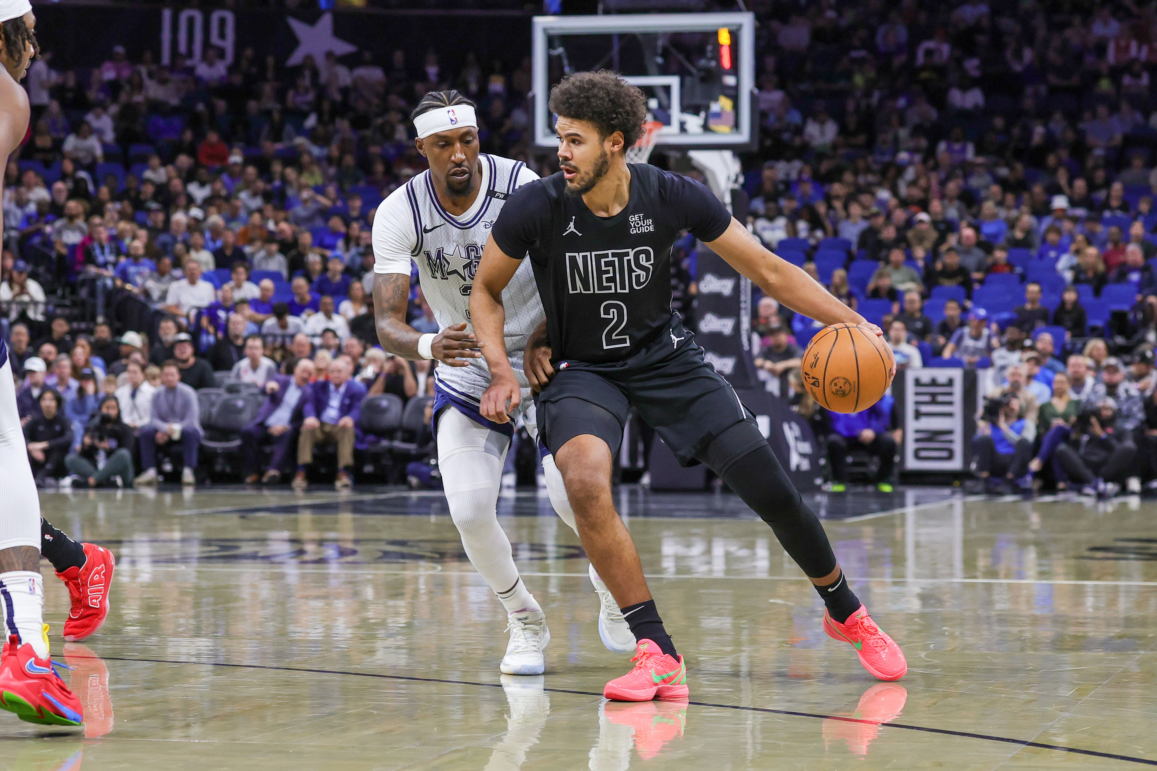 Brooklyn Nets forward Cameron Johnson (2) drives around Orlando Magic guard Kentavious Caldwell-Pope (3) - Source: Imagn